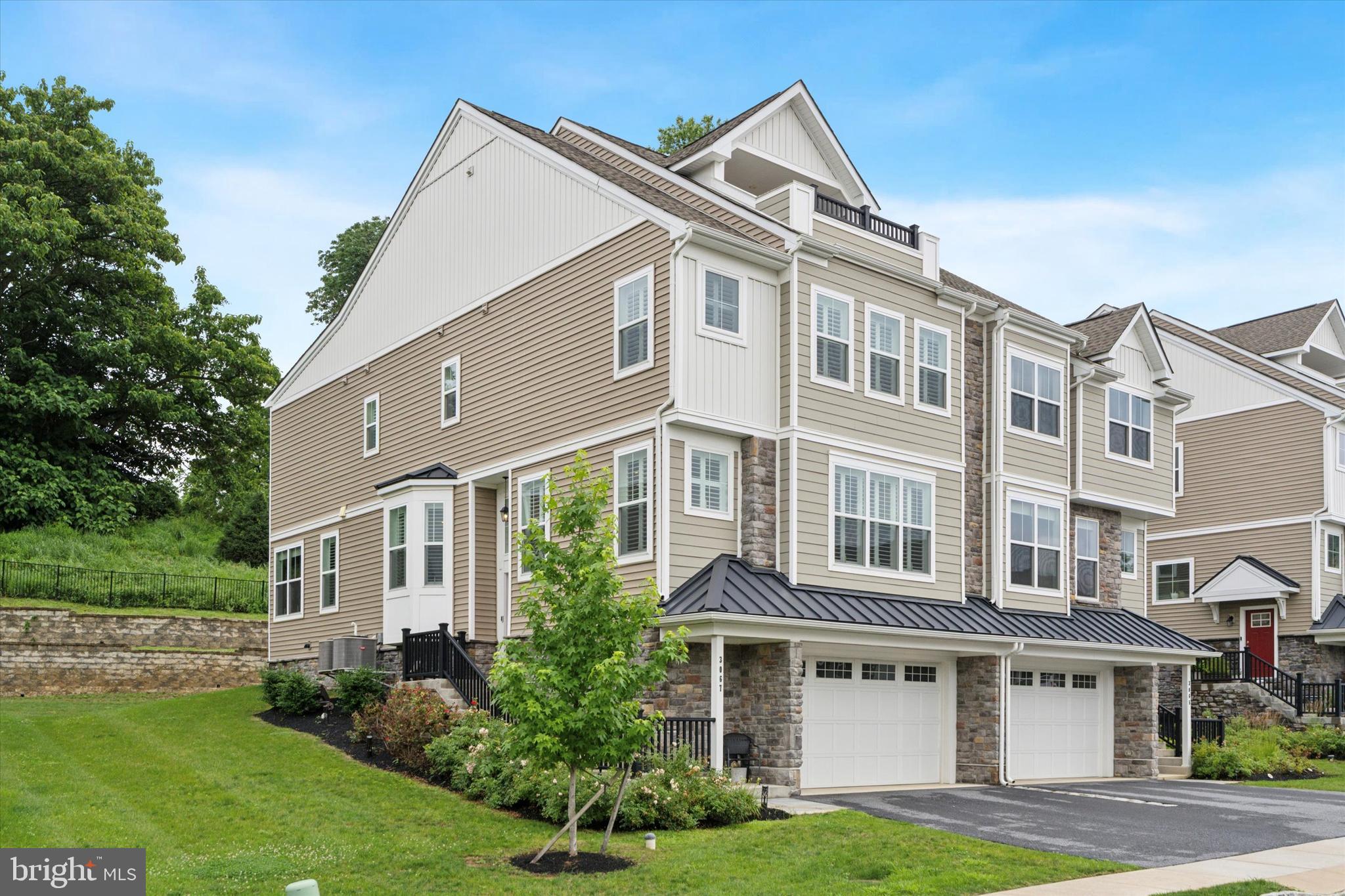 Amazing Garnet Valley Home, has it all! 4900 square feet of luxury living!! Largest floor plan with all the extra bump outs, added sunroom, added primary sitting room/office and not one but TWO balconies on the 2nd upper level! Enter from your 2 car, street level garage, where you will find a completely finished area that is perfect for entertaining and even has a half bath! The main floor is completely open and features gorgeous hardwood flooring, gourmet kitchen, dining area, spacious great room with eye catching floor to ceiling custom stone around the recessed electric fireplace! There is even a lovely sitting area/sunroom off of the kitchen, that leads to your private deck! The 2nd floor features the primary bedroom suite, complete with sitting area and 2 walk in closets with added shelving and racks to fit every season in your wardrobe! You will find 2 additional bedrooms, hall bath with double vanity and the laundry room! The 2nd upper level is a must have, that was an option when building, so you won't see it in many other homes that have sold in Garnet Reserve!!! Currently, this space is being used as a 4th bedroom suite that accommodates a queen sized bed, large dressers, full size sofa set and a half bath! From here, you access not 1 but 2 amazing balconies to take in all the views and sunsets! This home has barely been lived in, yet, it is complete from top to bottom!! Highlights include: professional paint throughout, stone fireplace and custom mantel, kitchen backsplash, added recessed lighting, window moldings, laundry room cabinets, closet shelving, composite garage flooring and anyone who knows me, knows I love plantation shutters!! Every window has a custom shutter or roller shades!! Looking to enjoy the outdoors or take a nature hike? The seller built a 1.5 mile trail system in the community owned woods!! This home is quite amazing and absolutely turn key!! All of this in the award winning Garnet Valley School District with easy access to major roads and cities( 15 min to Philly airport!) plus plenty of shopping and fine dining! Check out the photos and video for all of the highlights! You don't want to miss this one!!