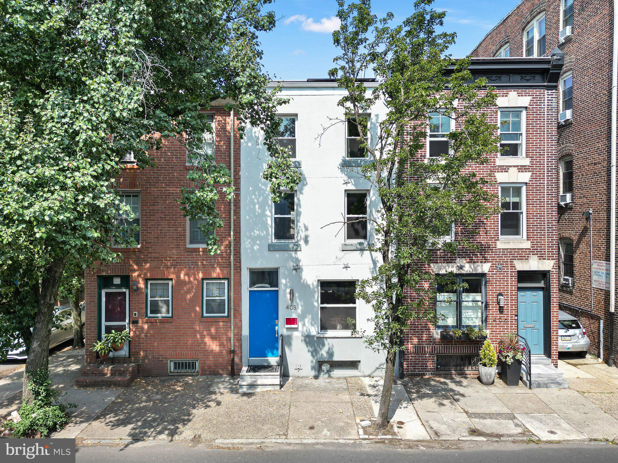 Welcome to this exquisite home, fully renovated in the heart of sought-after Fitler Square. This property truly has it all- modern updates in a historic home and close to Center City restaurants, grocery stores, CHOP, the University of Pennsylvania, the beautiful Schuylkill River Park and located in the popular Greenfield Catchment! Step into the open first floor with dinette and kitchen, showcasing quartz countertops, stainless steel appliances, an upgraded backsplash, and a breakfast bar. The hardwood floors seamlessly flow throughout the open floorplan, making it perfect for entertaining. The spacious family room features an oversized sliding glass door that opens to a serene patio area with a custom-built storage unit/flower bed, perfect for bicycles and gardening. A convenient powder room completes the first floor. Upstairs on the second floor you’ll find two generous bedrooms, each with ample closet space and a beautifully appointed hall bath with upgraded tile and double vanity. The floor also includes a dedicated laundry room. The third floor boasts an incredible master suite with vaulted ceiling, an impressive custom walk-in closet, and a luxurious master bath with an oversized shower, upgraded tile,
and a double sink vanity. To finish it off, enjoy breathtaking views of the city skyline from your private roof-top deck. A partially finished basement provides living space, perfect for a media room, home office, or gym. There is also unfinished space for plenty of storage. You will love the utility costs of this home! All major mechanical systems were updated in 2019 and include a tankless water heater. The owned solar panels convey with the home and will keep electricity costs low!
* Seller will pay for 6 months of parking at Walnut Bridge Parking.