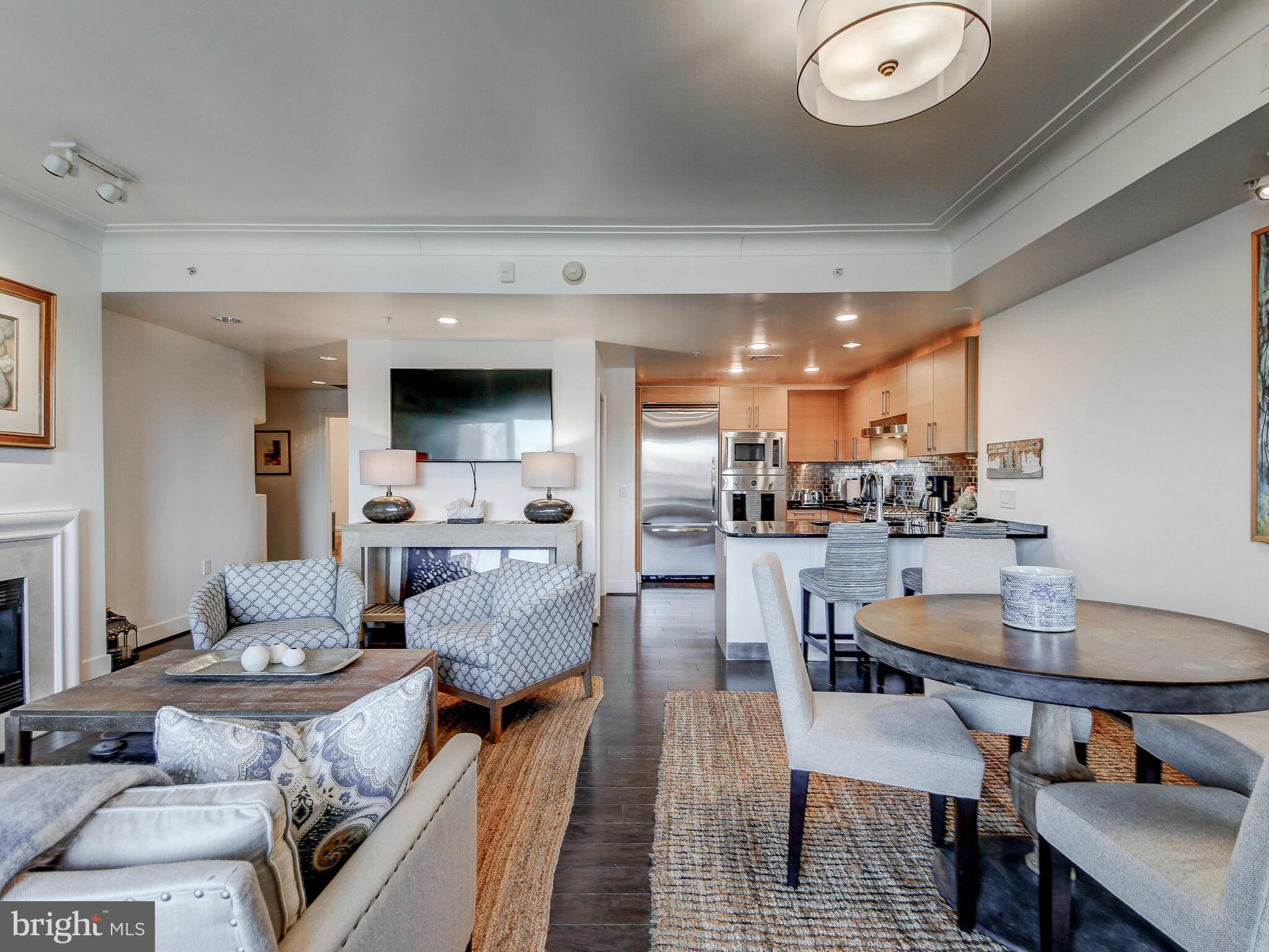 Step inside this elegantly appointed residence and be immediately taken by its open concept design, allowing natural light to flow seamlessly over the beautiful floors. Each of the two spacious bedrooms boasts its own sumptuous ensuite bathroom, offering the utmost in comfort and privacy. Residents of this community enjoy the reassurance of 24/7 front desk staff, ensuring both convenience and security. Dive into relaxation with an indoor pool and spa, stay fit in the state-of-the-art gym, or enjoy an evening film in the private theater. For those with business or entertainment in mind, the board room and party room stand ready, while valet parking adds an extra touch of luxury. All of this, ideally nestled in the heart of the vibrant Inner Harbor.