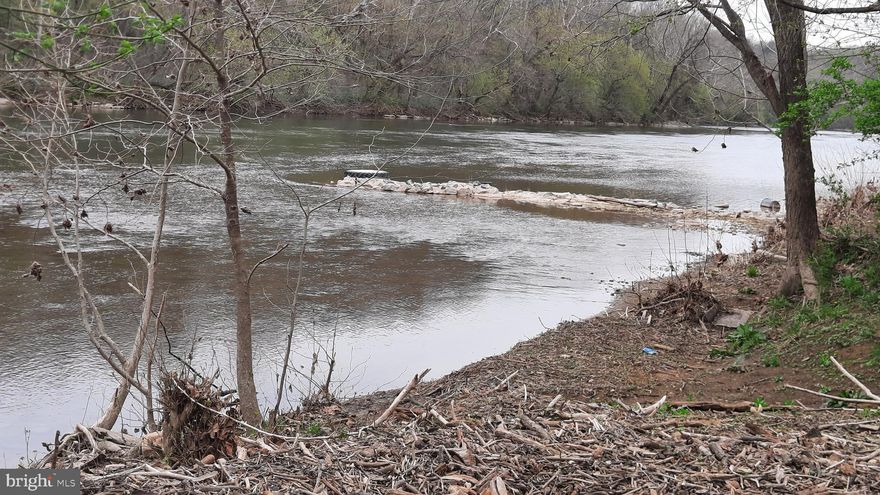 Looking for a spot to enjoy the Shenandoah River? Look no further, here it is! This 1.25-acre riverfront lot is mostly level with 100' of river frontage. The bank has been excavated for easy access to the water. There is electric on site and a metal carport for shade and shelter. The property is also gated. Make this your private oasis for outdoor fun!