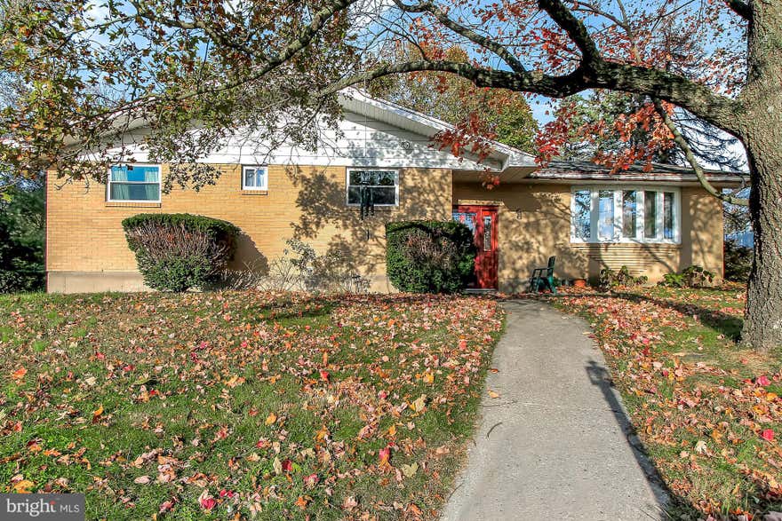Plenty of room for the whole family in this beautiful four-bedroom home.   Solid and well-maintained, this is one to see!  With fresh paint, new windows, upgraded plumbing, new interior and exterior doors, upgraded kitchen and baths, there is nothing for you to do except unpack and settle in.  You will also appreciate the original hardwood floors, induction cook-top, central air, 2-car garage and spacious backyard.  The unfinished basement offers plenty of storage, and can be converted into extra living space.  This charming, all-brick ranch is in a great neighborhood and won't last long.  Schedule your showing today.