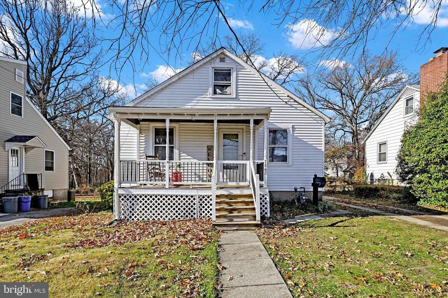 Spacious home on a RARE .35 Acre lot in Parkville. 3 levels of living space offering over 1900 sq ft. The cozy front porch welcomes you into the home. HARDWOOD flooring flows through the sun-drenched living room. Two bedrooms, both with hardwoods are on the main level. Recently RENOVATED bathroom with Tub/shower combination, 42" Vanity and LVP flooring.  The perfectly placed kitchen joins the family room and living room offering laminate flooring and an abundance of wood cabinetry. The family room ADDITION (25'x19') is the perfect space to relax! Sliding door to the deck, pellet stove, vaulted ceiling and plenty of space for entertaining! The upper level has 2 additional bedrooms. More space in the lower level with LARGE REC ROOM offering laminate plank flooring and a half bath. Utility room with a workbench and storage cabinets. Washer and dryer in the laundry room convey as well as the freezer! Enjoy the outdoors on your deck complete with gazebo! The large backyard is partially fenced; the property goes beyond the fence line. Exterior painting in 2023. New gutters 2021. Don't miss this rare find in conveniently located Parkville!