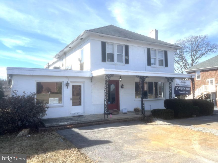Outstanding two unit building on busily traveled state road. adjacent to Washington County Health Department.  # year lease on commercial unit (full first floor) spacious two bedroom apartment on second level. Ample off street parking! Newly installed water and sewer utilities.