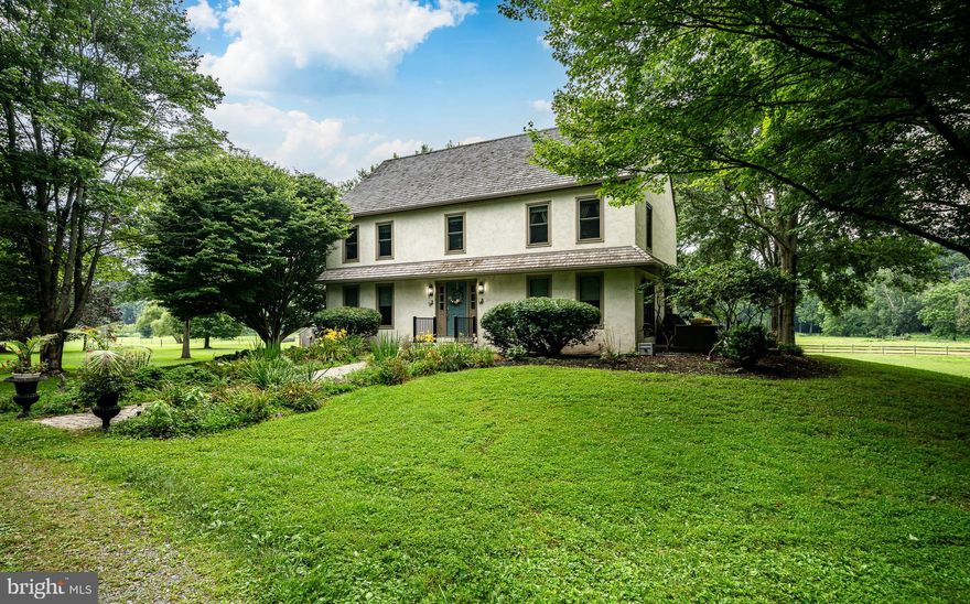 Discover your dream equestrian farm nestled on 10 picturesque acres in the coveted Unionville-Chadds Ford School District. This delightful property features a charming three bedroom home with two full baths and one half bath, along with a lower-level apartment and a well designed six-stall barn. The post and beam construction was crafted by the talented local artisan, Hugh Lofting. The home showcases warm wood tones and exposed beams that exude character and charm. As you enter, the foyer welcomes you with a dramatic open staircase and cathedral ceiling, setting the tone for this exceptional property. The spacious Living Room (15’ x 25’) is perfect for relaxing or entertaining, featuring a cozy fireplace adorned with marble facings and a custom wood mantel. Flanking the fireplace are elegant cabinets, and two glass doors lead to a serene side patio with stunning southern views over lush lawns and pastures. An antique door houses an inviting bar that is perfect for entertaining. The formal Dining Room, accessed through pocket doors from the adjoining Kitchen, ensures a good flow. The well-appointed Kitchen boasts ample workspace with an island and breakfast area with a glass door that leads to a patio, providing breathtaking views of your horses and pastures. Retreat to the Primary Bedroom, complete with a walk-in closet and a private full bathroom. Two additional bedrooms share a Hall Bathroom, conveniently housing the laundry facilities. The lower-level apartment features its own Living Room, Kitchen, Bathroom, and Bedroom, providing flexible living options for guests or family. Equestrian enthusiasts will appreciate the six-stall barn, equipped with mats in each stall, a tack room, wash stall, and feed room, and staircase to access the loft. The barn's antique doors add a unique touch. Complementing the property is a two-car shed garage, lined with wood paneling. Finding a ten-acre equestrian property with such incredible amenities in the Unionville equestrian area at this price is a rare opportunity. Bordering the scenic Brandywine Creek, this historic waterway is just a short distance from your home, offering fantastic canoeing and fishing experiences. Plus, enjoy the benefit of extremely low property taxes as the property is in Act 319! New HVAC! New appliances!