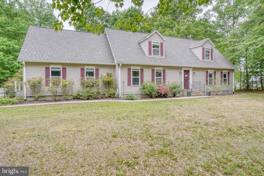 Tucked away on a serene 1.13-acre wooded lot, this exceptional cape cod is the private retreat you have been searching for. Immaculately maintained and truly move-in ready, this one-of-a-kind property delivers the perfect combination of privacy, space, and convenience - all within easy reach of Delaware's stunning beaches, Route 1, and an abundance of shopping and dining options.
Step inside and discover a thoughtfully designed floor plan that adapts effortlessly to your lifestyle. A generous flex room just off the entry invites use as a home office, formal dining room, or additional sitting area - the choice is yours. At the center of it all is an updated eat-in kitchen boasting granite countertops and stainless steel appliances that flows seamlessly into a warm and inviting family room - the perfect setting for both relaxed everyday living and effortless entertaining.
The main level is home to two impressive bedroom suites. The expansive primary suite features a dedicated sitting area, while a second suite - complete with its own private entrance - presents a rare and exceptional opportunity for in-law living or multigenerational arrangements. Upstairs, three generously sized bedrooms and a dedicated office provide outstanding separation of space for guests, hobbies, or remote work needs.
Adding even more value is a detached two-car garage topped with a finished loft - an incredible canvas for a guest suite, creative studio, or generous storage solution.
Embraced by mature trees and sprawling over an acre of lush land, this remarkable property offers the privacy, condition, and versatility that today's discerning buyers are actively seeking - all within comfortable reach of the Delaware coastline. Do not miss this one - schedule your tour!