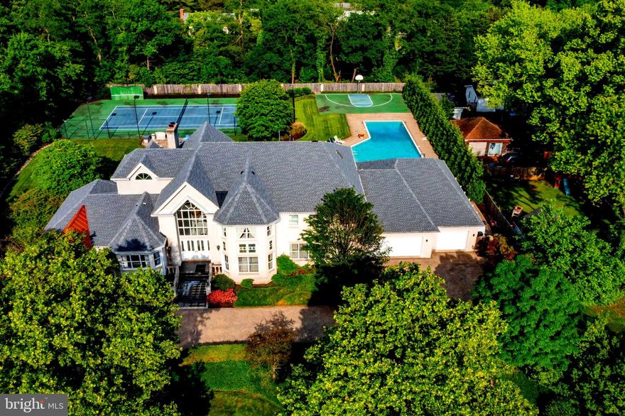 Welcome to 6239 Medora Rd 
This magnificent estate, though it carries the charm of its era, stands as a testament to classic luxury and timeless design. The sprawling property features a grand mansion with distinct architectural elements, reflecting the opulence and style of its time.
The estate is enveloped by lush, mature trees and well-kept gardens, offering a serene and picturesque environment. Complete with Lighted Tennis Court for sports enthusiasts. 
 A large, inviting swimming pool sits adjacent to the house, surrounded by a meticulously landscaped lawn and attached pool house with awning.  Ideal for relaxation and outdoor entertainment, the pool area also includes a poolside patio space for lounging. A full sports court sits next to the pool for the kids to play all day. The pool house is all you need to entertain with its own kitchen and appliance’s. The pool house features changing rooms with showers and bathrooms.
When entering the home you are greeted by a complete open floor plan that has stood the test of time. With a large home office just off the front door. Someone that works from home would adore! 
This 6 bedroom 10 bathroom home has so much to offer. Some of the most recent updates include a COMPLETE NEW ROOF put on in 2023. NEW HVAC SYSTEMS and HOT WATER HEATER 2023
Ample garage space is available, ensuring plenty of room for vehicles and storage. Plenty of room for guest car’s with a wrap around driveway. 
 Potential features to upgrade include spacious room for  a gourmet kitchen, formal dining room, multiple 6 bedrooms with en-suite bathrooms are ready to be taken to the next level.  
Expect custom details such as hardwood flooring, crown molding, fireplaces, and built-in cabinetry, reflecting the home's high-end status.
The fully finished basement features a full wet-bar, Sauna, fireplace. With even more storage space and full laundry room with a large cedar room/ closet  to store clothing.
Medora's basement  features a home gym in the basement and extra bedroom for guests.
Get on all  major commuter route’s  including 95,695,295 within 5 min or less.  Close to Baltimore City, Washington DC and Annapolis  Close to Light Rail and Marc trains make for an even easier  commute! Get to BWI in Minutes!!
This estate is a haven for luxury and recreation, perfectly blending sophisticated living spaces with extensive outdoor amenities. It caters to a lifestyle of comfort, leisure, and grandeur, making it an ideal residence for those who appreciate fine living and private, spacious environments. Come and put your finishing touches on this one of a kind home in Linthicum MD.