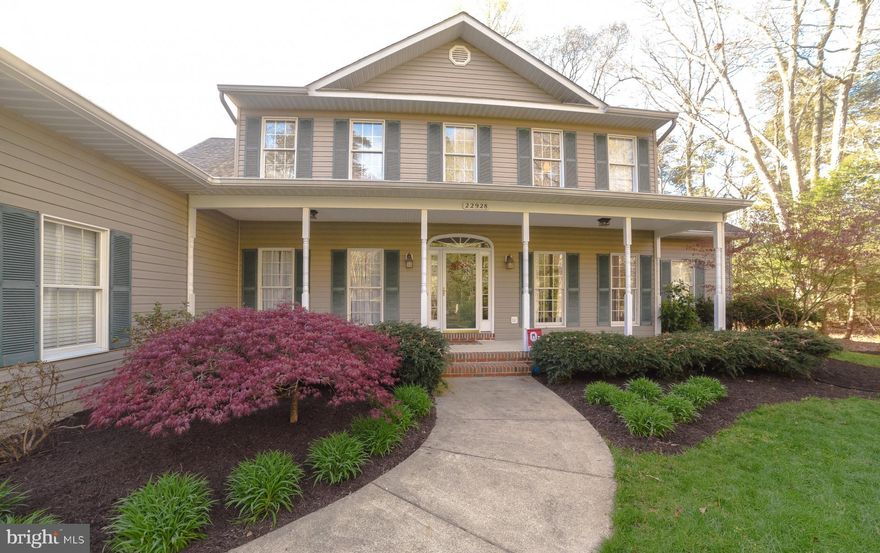 This stunning single-family home located at 22928 Cattail Ln in California, MD was built in 2000 and offers a spacious and luxurious living space. With a finished area of 4,622 sq.ft. situated on a generous 1 acre lot that includes a 35,000 gallon heated pool with outdoor bar area. The detached one bedroom. one bath apartment is perfect for an in-law suite or income property. Kitchen renovation completed in 2023.  The open-concept layout allows for seamless flow between the living room, dining room, and kitchen, making it easy to entertain guests or keep an eye on the family. The kitchen is a chef's dream, with stainless steel appliances, quartz countertops, and plenty of cabinet space for storage.Located in the desirable Wildewood neighborhood, close to schools, shopping, and dining, this property truly has it all. Don't miss your opportunity to own this beautiful home.