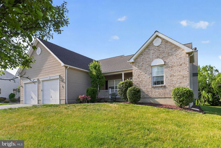 Rarely offered, highly desired single level living in Stonefield! The curb appeal is the second thing you'll notice, after the oversized, freshly surfaced, driveway! Make your way to the recently improved front porch, with new vinyl posts & railing, freshly painted shutters & trim and bright manicured landscaping. Step through the storm door and into the entryway. Note the shiny hardwood floors and head to your right. There are 2 nicely sized bedrooms with ample closets and a hall bath, offering separation from the main part of the home, which increases privacy for all occupants and guests alike. To the left of the entry, there is a formal dining room. Use it as such, or make it a second living space. The choice is yours. It leads directly into the spacious kitchen with a large peninsula and lots of cabinet space. The kitchen is open to the living-room, with cozy gas fireplace, making entertaining a breeze. The primary bedroom is left of the kitchen. Large, with multiple closets, attic access in one of them, and there's an en-suite bath. This will be your own personal getaway. The laundry room is nearby and provides access to the garage. Prepare yourself. It is enormous. It can fit 4 cars. If you don't need the car space, use it as a workspace or convenient storage. There is attic access, and brand new double doors that lead to the side yard affording you easy access to yardwork tools. Back inside, head down to the basement. HUGE. Ready for finishing, if your needs call for it. Head out back and check out the massive shed and tree lined view. The HVAC is icky 5 years old and the roof was replaced 2017. There is a lot to love about this home. Make it yours.