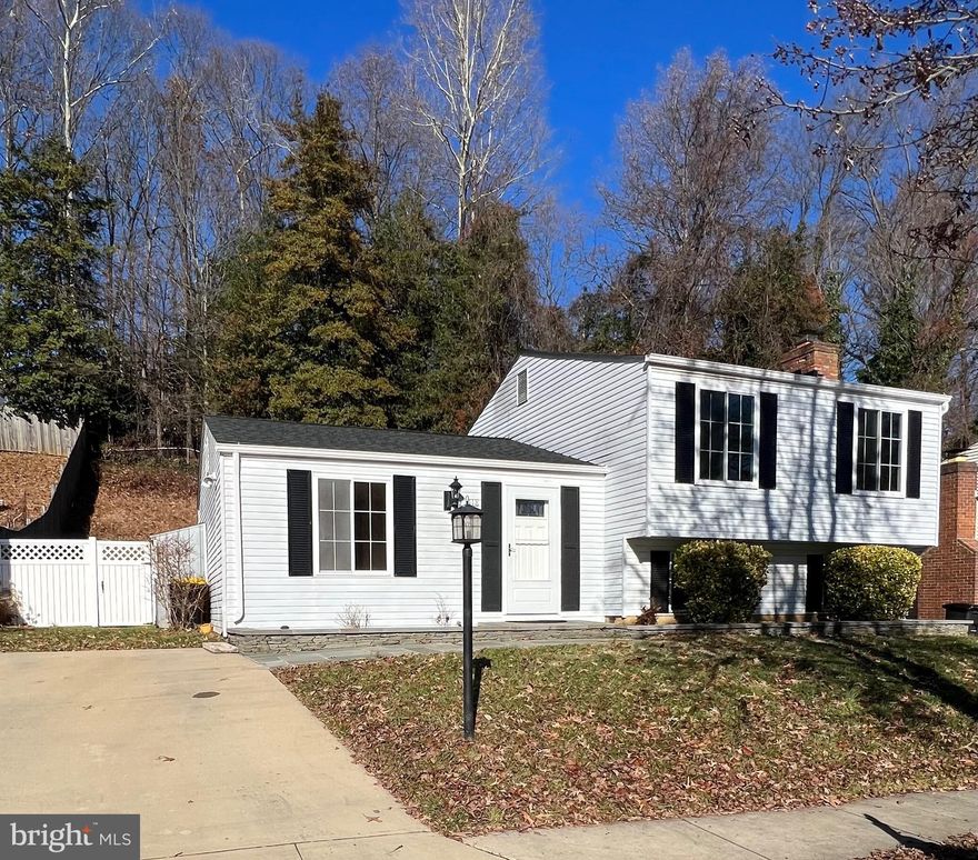 Charming Home in an Ideal Location! 

Nestled on a tree-lined cul-de-sac, this home offers a perfect blend of comfort and convenience. The fully fenced backyard ensures ample privacy for you and your family.

As you walk through the main level, you'll be greeted by a bright living room that seamlessly flows into the country kitchen. The kitchen boasts stainless steel appliances, and an adjoining dining room leads to a lovely screened porch.

The lower level offers a cozy family room, built-in bookshelves, a bedroom/home office, and a half bath. 
Upstairs, the primary bedroom features a walk-in closet, while two additional bright bedrooms and a full bathroom round off the upper level.

This home's prime location offers easy access to commuter routes, shopping, restaurants, parks and recreation, downtown Annapolis, the Chesapeake Bay Bridge, and much more!