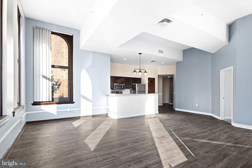 Welcome to Mural Lofts, where history meets contemporary living in the heart of Philadelphia. Located at the corner of Broad and Spring Garden, this stunning five-story building has been transformed from the historic Thaddeus Stevens School of Practice into distinctive loft apartments that blend timeless architectural details with modern comforts.

Key Features:
Unique Loft Apartments:
Each unit showcases the building’s original charm, including high ceilings, expansive windows, and intricate architectural details that set Mural Lofts apart.

Prime Location:
Situated at the gateway to the North Broad Corridor, Mural Lofts is just a few blocks from City Hall, putting you within walking distance of some of Philadelphia’s best dining and entertainment. Convenient access to public transportation makes exploring Center City effortless.

Historic Redesign:
This thoughtful redevelopment preserves the character of a landmark building while delivering all the amenities you need for modern urban living.

Come see why Mural Lofts is the perfect place to call home! Experience the unparalleled charm and convenience of living at the crossroads of history and contemporary Philadelphia.