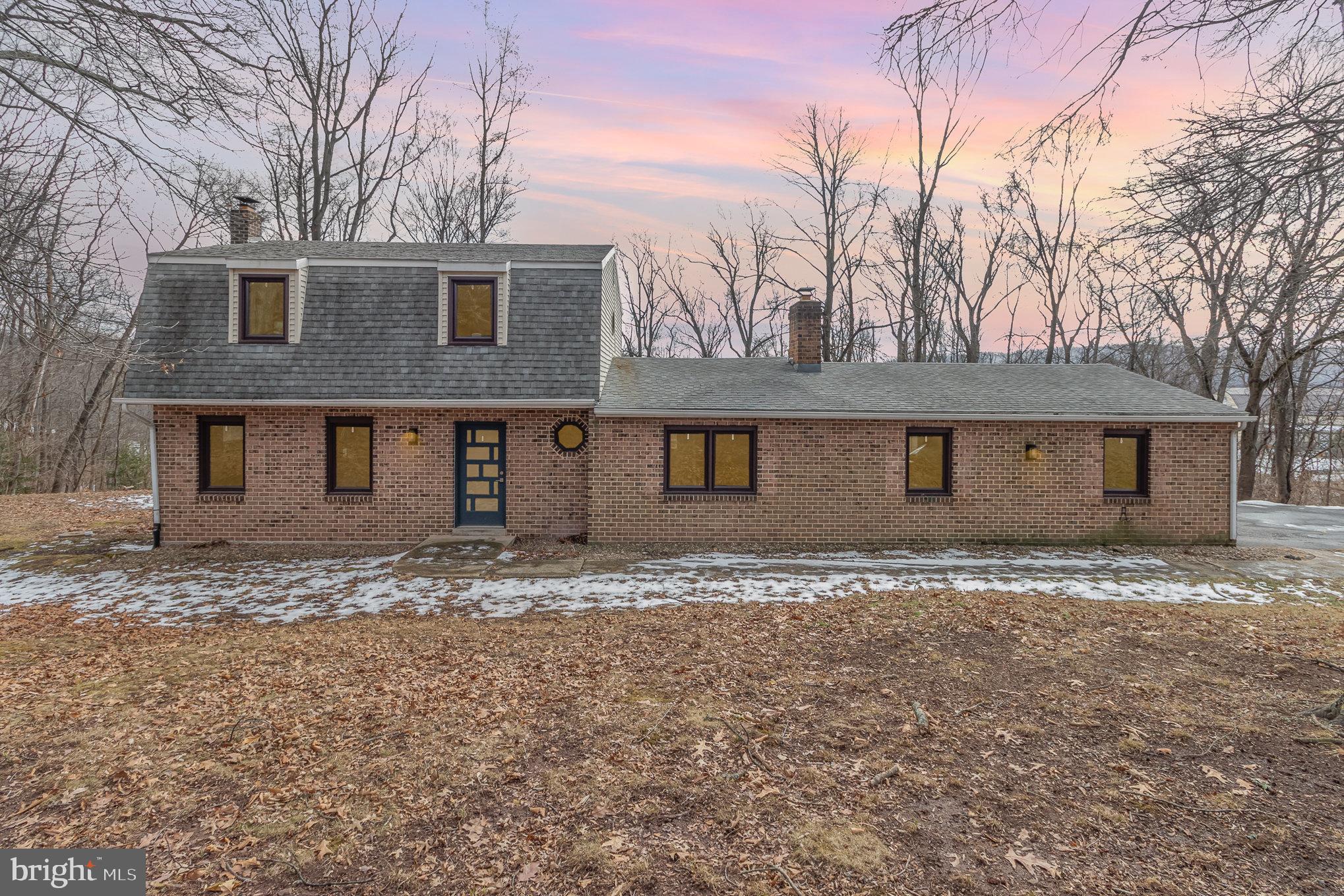 Discover your ideal country retreat just minutes from all amenities. This updated home on 5.46 acres has been lovingly updated and maintained. The glass accented front door and modern foyer welcomes guests with fun style and color. Large entryways and continuous bamboo hardwood flooring provide a flowing floor plan to the living and dining rooms. The formal dining room flaunts a large bow window offering picturesque views overlooking your wooded lot with abundant wildlife. The kitchen provides ample cabinet and counter space, a center island, stainless steel appliances and a serene two-tone color palette. Adjacent is a spacious family room featuring a brick, wood-burning fireplace, a perfect spot to curl up with a good book or gather with loved ones. Adjoining the family room is a half bath featuring stacked stone tile walls, porcelain tile flooring, and an updated vanity with waterfall faucet.
Upstairs are 3 bedrooms and a full bath. The primary bedroom features his & hers closets. The 2nd bedroom contains two closets for ample storage. The 3rd bedroom includes a Murphy bed and fold-down wall desk, ideal for guests and workspace needs. The remodeled bathroom features double sinks, a walk-in tile shower with shower nooks, and ceramic tile flooring. If you always find yourself lacking space for storing bathroom necessities, you'll be thrilled with the tall cabinet between the sinks in addition to the traditional linen closet.
Stepping outside you'll find a large rear deck with breathtaking sunrise views. In just a few short months, you can be swimming in your in-ground pool with newer pump, filter (2017) liner (2020), new automatic pool cleaning robot (2024) and safety cover. Enjoy abundant wildlife on the property's incredible 5.46 acres with a drivable access road. The spacious pasture provides a peaceful and serene setting and welcomes a perfect mix of sun and shade for a host of outdoor activities for the hobbyist or just simply relax and enjoy the solitude of the outdoors. The property also contains a 2-story 36 x 22 barn, with horse stall potential and an abundance of space for storage. The barn also has its own onsite well.
Other features and updates include a 2 car garage with dual automatic garage doors (2020), storage above, newer roof (2012), tankless hot water heater (2021), updated 100 gallon propane tank in 2024 and additional propane hookups available for stove and fireplace), central air installed in 2022, new well pump in 2011, wood burning stove (2018) in basement for alternative heating option and a radon mitigation system. This home truly has it all and will be the sanctuary you've been dreaming of!