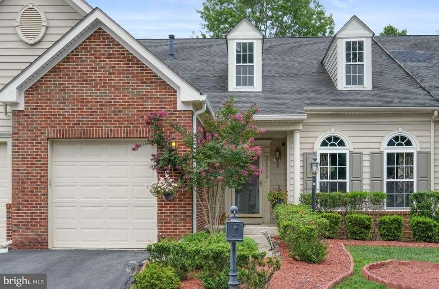 Are you looking for main level living? This 55+ Active Adult Community meticulously maintained home is stunning and expertly crafted with over 4380 square feet. Located in the heart of Bowie, this home is an ideal location with incredible accessibility to Shops, restaurants, Washington, DC and Baltimore. This home will fit your lifestyle with main level living. Master Bedroom Suite has a full bathroom with double sinks, Laundry room/storage mud room accessible from garage. Half bathroom, Morning Room all on the main level. The Open Sun Filled Living room and Dining Area have newer carpet. The Foyer and Kitchen have hardwood floors. Carpeting throughout the home. As a touch of elegance there is a Custom Mirror in the Dining Area. The Kitchen opens to the morning room. It is complete with a huge granite topped Island that seats six. The kitchen has beautiful granite counter tops with matching back splash. The Loft offers you room to relax on the upper level. There are 2 large Bedrooms both with walk-in Closets on the Upper Level. Large Storage room in the Loft. Beautifully finished Basement with an electric fireplace. Community Amenities make your new lifestyle easy living. Club House with outdoor pool, Gym, Exercise Room, Computer Room all available to residents. No more cutting grass or shoveling snow. Ask about exceptions to age requirements. Transferable Home Warranty covering all appliances, house air conditioning, heating, plumbing, and electric systems. Additionally, 2 years manufacturer's warranty remaining on air condition/ furnace unit. Brand new Whirlpool refrigerator with optional 2nd refrigerator conveyance. Sewage ejector pump updated/ replaced 2 years ago. Deck was just completely replaced. HOA fee covers all lawn maintenance and community common area landscaping, snow removal, roof replacement/repairs, deck replacement/repairs, house power washing, gutter cleaning, house exterior repairs. Clubhouse: 24 hour access to community Clubhouse, access to Clubhouse for personal events and use (work stations). Several free catered holiday and special events throughout the year. A pool for relaxing. Access to a workout facility and larger pool. A guest area with ample parking.