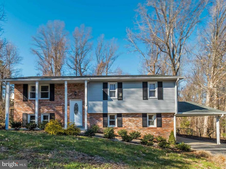 Affordable- 4 bedroom & 3 full baths Split foyer has so much to offer. Stainless steal appliances, center island, granite countertops, master bedroom with full bath, finished basement with large bedroom & full bath, pellet fireplace, walk out level , large deck,  fenced in backyard with shed, paved driveway with covered carport.  BEACH COMMUNITY