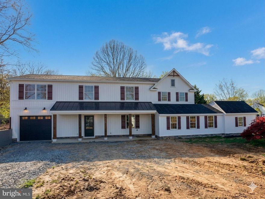 A stunning transformation! This former cabin has been expertly renovated and expanded into a modern, stylish home with 2,720 sq ft of finished living space. Completely reimagined from its original roots, this beautifully updated home blends charm with modern living while preserving elements of its history, including original cabin walls that remain intact. Offering 3 bedrooms and 3.5 bathrooms, each bedroom features its own private en-suite bath. The thoughtfully designed layout includes a first-floor office—highlighted by a stunning ceiling crafted from reclaimed wood sourced from the home—a cozy sunroom on the main level, and an open-concept living room and eat-in kitchen, perfect for today’s lifestyle. The kitchen is a standout, featuring white cabinetry, a large center island, and stainless steel appliances. The home also offers luxury vinyl plank flooring on the main level, hardwood floors upstairs, and energy-efficient spray foam insulation throughout. Enjoy your morning coffee on your expansive front porch or entertain on your paver patio overlooking your large backyard.  Have peace of mind with the brand new conventional septic system. A deep, oversized garage provides excellent storage and functionality. This home is truly move-in ready and is located within the sought-after Damascus High School feeder pattern.  Available for showings April 30th.