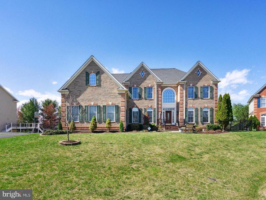 If you know NV Homes, then you know this super popular and elegant 'Clifton Park' model which has multiple bump outs and extensions and is loaded with just about every high-end option offered by NV Homes.  The tax record is incorrect.  This home offers over 7,700 sq ft of space with 5 bedrooms and 5.5 baths and sits on a gorgeous half acre cul-de-sac lot with a fenced in rear yard, rear patio and beautiful 40,000 gallon, salt water, in-ground swimming pool that you can enjoy this summer!  Roof was replaced in 2020.  Hot water heater has also been replaced.  Located in the heart of South Riding, this home is located  on a private cul-de-sac and offers you the privacy and serenity you desire .  As soon as you walk in the front door, you  will notice the gorgeous Brazilian cherry wood floors that you'll find on two levels.  The huge kitchen offers plentiful 42" upgraded cabinetry, large center island, granite counters and ceramic tile backsplash with professional grade Viking stainless steel appliances including a gas stove, vent hood, wall oven, built-in microwave, dishwasher and refrigerator with ice maker.  This home was built for entertaining with an spacious kitchen with island that opens to the two-story family room that is flooded with light.  This room features a custom, built-in entertainment center!  Also on the main level if an office/den, formal dining room and living room.  Upstairs, a double door entrance leads you into the primary bedroom suite with sitting room, tray ceiling with chandelier and spa-like primary bathroom with two vanities, large jetted tub and separate shower with dual shower heads.  Just wait until you see the MASSIVE walk-in closet!  Each bedroom on this level features an en suite private bathroom.  The walk-out lower level features a large rec room with gas fireplace, theatre room, wet bar, game room and bonus 5th bedroom and 5th full bathroom.  You can walk out and enjoy the fully fenced rear yard with brick-paver patio and swimming pool!  Get ready for summer! This home has it all!  Your private oasis awaits you!