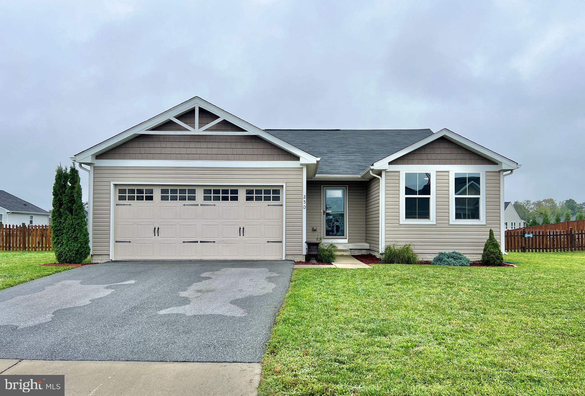 UH OH... Back on the market due to Buyer's loan being denied with a price improvement! No fault of the seller . Their loss is your gain! STILL OFFERING $2000 closing assistance TO BUY DOWN INTEREST RATE!!! Ranch Style Living done Right! Nestled in the wonderful community of Arcadia Springs with its quaint sidewalks and tot-lots, is this cutie! This very convenient commuter location is less than 2 minutes to to Route 9 and the VA Hospital, and also very close to I - 81, Hospital, shopping, Target, grocery, and 20 minutes to the VA or MD State lines. The Marc Commuter Train available.
The home itself boasts hardwood floors throughout the Entryway, Great Room and adjoining Kitchen. Gleaming black appliances, large island and ample cabinetry create a beautiful kitchen to make this a wonderful space for entertaining. Don't miss the chandelier over the island! The Sliding glass door off the kitchen, opens to a fully fenced, level backyard. A dog door is already installed for Fido!
Bedrooms have neutral carpet and plenty of closet space. The Primary Bedroom has ensuite bath, and walk-in closet.
Large Basement has egress window, rough-in, and plenty of space for a 4th bedroom and full bath. Finish it according to your desires and DOUBLE the square footage of your home. Spacious 19 X 20 2-car Garage.
Hike the Appalachian Trail, go tubing on the Potomac or Shenandoah Rivers, and enjoy the many parks nearby. Only 5 minutes to The WV Route 9 Bike Path, a 10.5 mile paved multi-use trail is suitable for families with small children and strollers, dog walkers, walkers, and bikers.