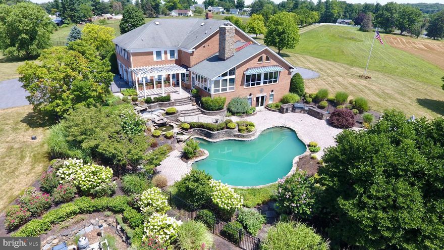 50 rolling acres of picturesque land off of hard surface road, conveniently located between I-270 (Mt. Airy) and I-70 (Clarksburg), this first class 4-sided, 3-car garage, brick Georgian colonial is one of the area's premier homes. Built to last, this 3-level home features 5 Bedrooms, 3 full baths, 2 half baths, and over 6,000 sq.ft of finished living space above grade. Accented by a beautiful in-ground pool, private tennis court, a fun baseball diamond, tree lined circular driveway, and stately white entrance columns, this home is truly above-the-crowd. Flexibly zoned residential, but permitted as a potential wedding venue, this property offers a lot of options. Schedule your private showing today!