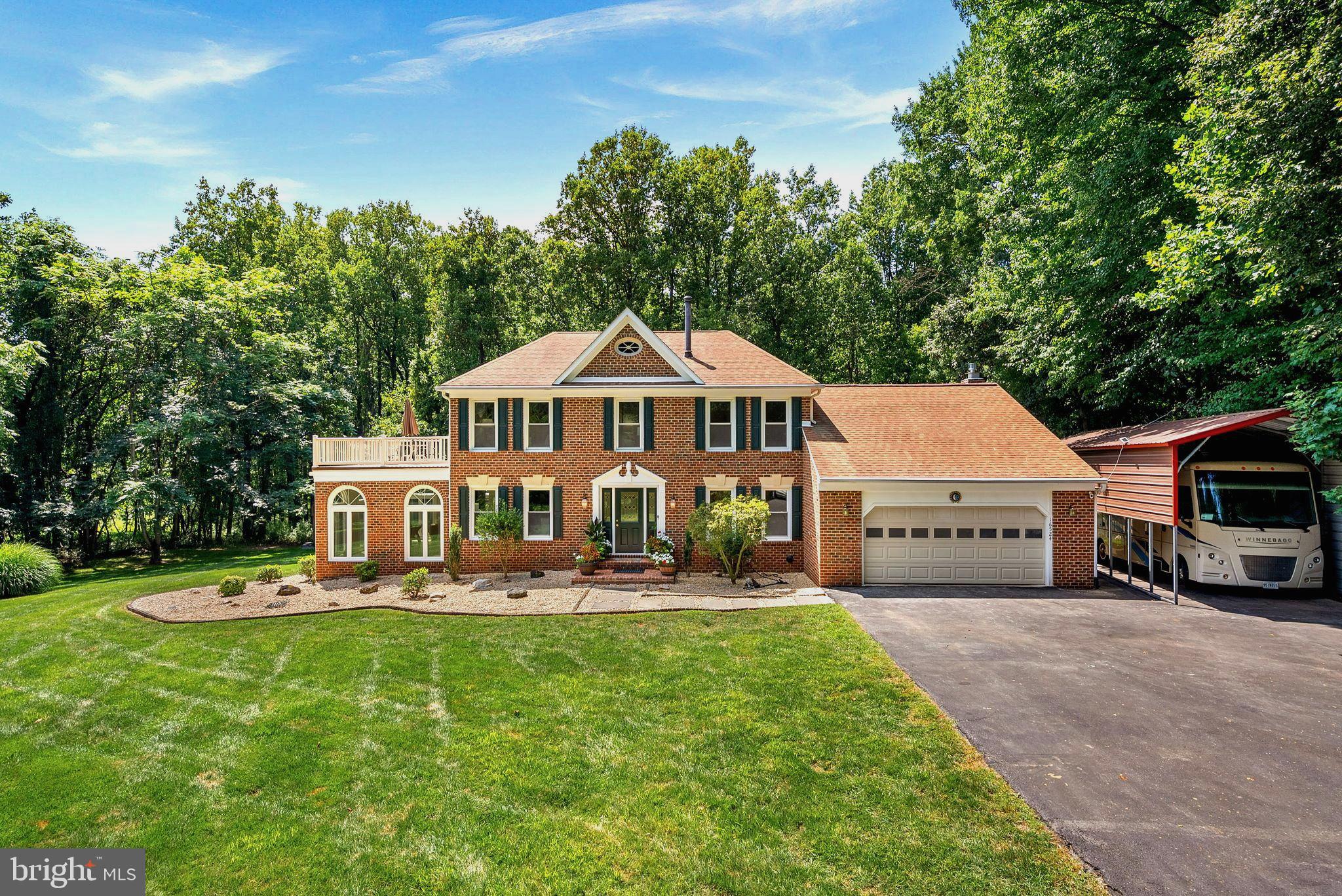 Norbeck Knolls... the site of fine homes and rolling landscape... is one of Montgomery County's best kept secrets! This beautiful custom home is tucked away on a gorgeous private cul-de-sac lot overlooking lush professionally landscaped grounds. These majestic homes are situated on magnificent two to thirty acre breathtaking home-sites, and the tree lined streets are whisper quiet with only one way into the neighborhood... via Norbeck Road... and one way out! This brick beauty is perfectly perched on a 3.5 plus acre homesite and amazing leafy views of nature can be enjoyed from almost every vantage point. The freeform inground pool is gunite (top-of-the line) and there is a natural gas pool heater if you like things warm and balmy. The gardens and pool are completely private with only the odd deer or songbird stopping by to say hello! This true center hall colonial is perfect for large scale entertaining or for those intimate nights curled up by the fireplace. The sunroom/conservatory located off the living room is a lovely spot to read or enjoy a cup of tea while tending to your indoor botanical garden. The aspect of this room is ideal and captures maximum sunlight throughout the day. The home offers a full in-law/au-pair suite with multiple rooms and separate daylight entrances along with an accessible bath . The finished lower level is drenched in sunlight with two sets of sliding glass doors leading to the patio and pool area. If you're the engineering type you will love the geothermal heating system, the tankless hot water heater, the full house generator, the invisible fence, solar panels which are "owned" and all the mod-cons and mechanical equipment that are both energy saving, state-of-the-art and good for your health! There is no HOA and no community fees. All sorts of delights to treat the most discerning buyer and the home has been freshly painted along with beautifully refinished hardwood floors, a first floor laundry room conveniently located off the kitchen, first floor family room with vaulted ceilings and skylights, a large custom deck perfect for dining alfresco, a rooftop deck off the primary bedroom for sipping your morning brew while you greet the sunrise! Speaking of sun, the east-west exposure is ideal for basking by the pool, enjoying the day as it unfolds to include fabulous sunrises and magnificent sunsets. Not to be missed this stately forever home checks all the boxes! The floorplan is superb and also very flexible and the approach to the property is beautiful as you come off the cul-de-sac to a long driveway that then opens up to reveal an expansive lawn with room to roam and play. Welcome home!
