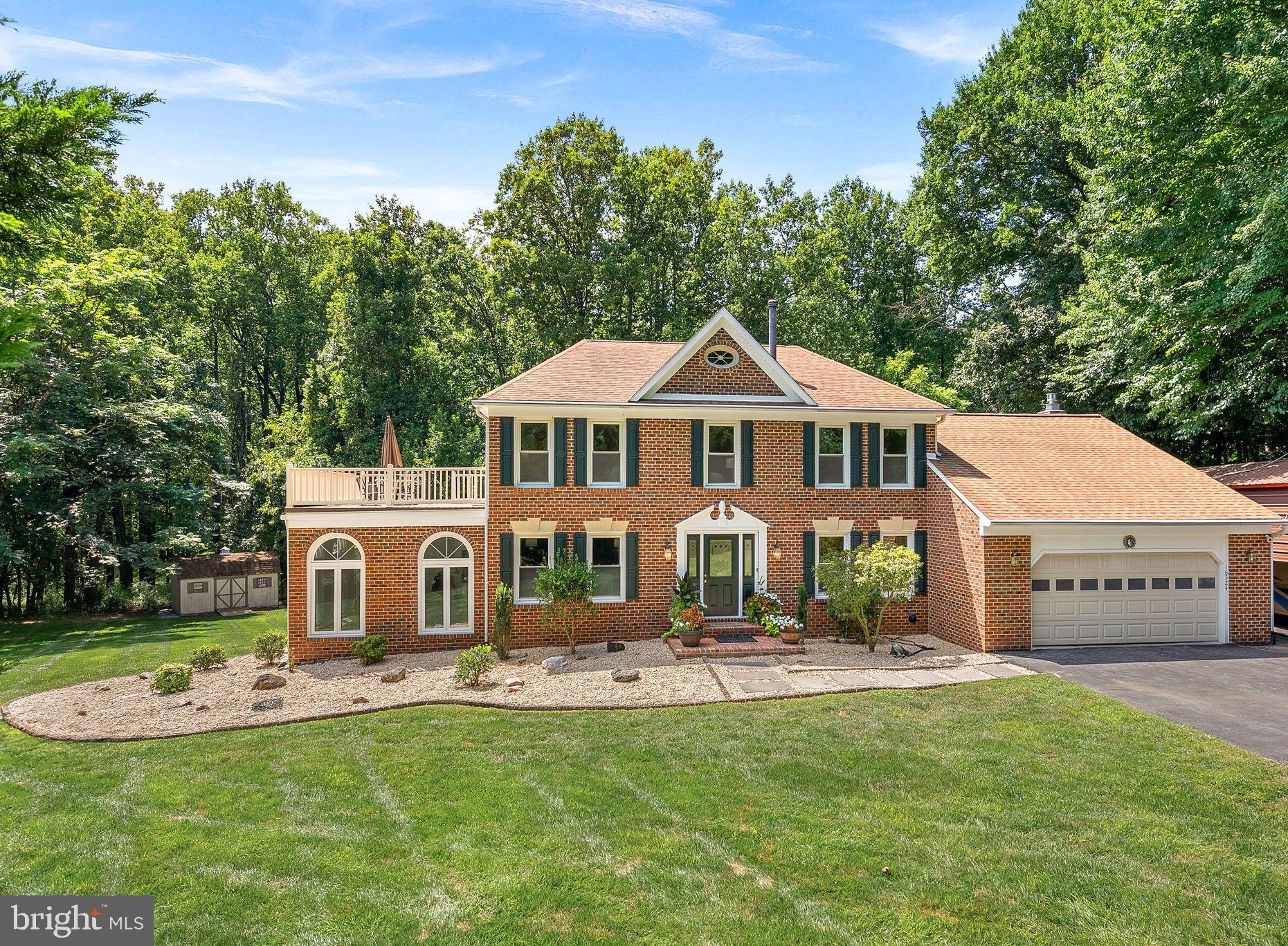 Norbeck Knolls... the site of fine homes and rolling landscape... is one of Montgomery County's best kept secrets! This beautiful custom home is tucked away on a gorgeous private cul-de-sac lot overlooking lush professionally landscaped grounds. These majestic homes are situated on magnificent two to thirty acre breathtaking home-sites, and the tree lined streets are whisper quiet with only one way into the neighborhood... via Norbeck Road... and one way out! This brick beauty is perfectly perched on a 3.5 plus acre homesite and amazing leafy views of nature can be enjoyed from almost every vantage point. The freeform inground pool is gunite (top-of-the line) and there is a natural gas pool heater if you like things warm and balmy. The gardens and pool are completely private with only the odd deer or songbird stopping by to say hello! This true center hall colonial is perfect for large scale entertaining or for those intimate nights curled up by the fireplace. The sunroom/conservatory located off the living room is a lovely spot to read or enjoy a cup of tea while tending to your indoor botanical garden. The aspect of this room is ideal and captures maximum sunlight throughout the day. The home offers a full in-law/au-pair suite with multiple rooms and separate daylight entrances along with an accessible bath . The finished lower level is drenched in sunlight with two sets of sliding glass doors leading to the patio and pool area. If you're the engineering type you will love the geothermal heating system, the tankless hot water heater, the full house generator, the invisible fence, solar panels which are "owned" and all the mod-cons and mechanical equipment that are both energy saving, state-of-the-art and good for your health! There is no HOA and no community fees. All sorts of delights to treat the most discerning buyer and the home has been freshly painted along with beautifully refinished hardwood floors, a first floor laundry room conveniently located off the kitchen, first floor family room with vaulted ceilings and skylights, a large custom deck perfect for dining alfresco, a rooftop deck off the primary bedroom for sipping your morning brew while you greet the sunrise! Speaking of sun, the east-west exposure is ideal for basking by the pool, enjoying the day as it unfolds to include fabulous sunrises and magnificent sunsets. Not to be missed this stately forever home checks all the boxes! The floorplan is superb and also very flexible and the approach to the property is beautiful as you come off the cul-de-sac to a long driveway that then opens up to reveal an expansive lawn with room to roam and play. Welcome home!