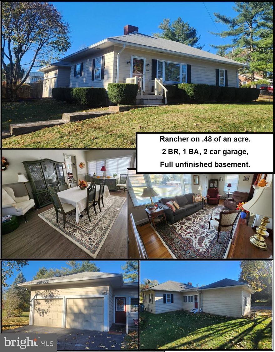 WOW, Rancher that is move in ready in great condition features 2 bedrooms 1 bath, large living room with hardwood flooring, kitchen with appliances, separate dining room leading to a 2 car attached garage. Almost 1/2 acre unrestricted lot, partially fenced rear yard (needs gate). Full basement with lots of room for storage, has shelving, & washer & dryer convey. Walk up floored attic. Heat pump new in 2017.