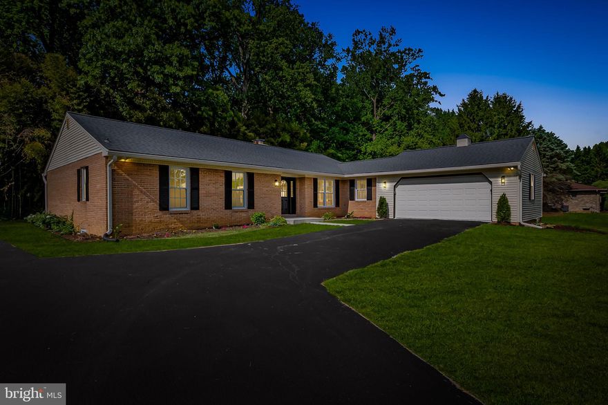 Welcome to 2708 Shady Grove Drive, where timeless charm meets modern elegance on over an acre of beautifully landscaped serenity in the highly desirable Pleasant Prospect neighborhood of Baldwin.  Brick rancher is more than just a house—it's a place to feel grounded, peaceful, and proud to call home.

From the moment you arrive, the long, private driveway and manicured grounds welcome you with a sense of quiet seclusion and everyday luxury.  Inside and discover over 4,000 square feet of thoughtfully designed living space, with a floor plan that flows effortlessly and creates the perfect balance between openness and coziness. New floors, fresh paint, and upgraded finishes throughout add warmth and polish to every corner.

The heart of the home is the brand-new kitchen, outfitted with all-new stainless steel appliances, stylish cabinetry, and ample space to gather, cook, and create memories.  The inviting family room, warmed by a double-sided fireplace, opens through French doors to a stamped concrete patio—an ideal spot for morning coffee or evening relaxation.  The layout continues to impress with a spacious main-level laundry room equipped with a brand-new washer and dryer, making everyday living effortless.

Retreat to the fully finished lower level, a massive basement with endless possibilities—home theater, gym, playroom, or guest suite—with walk-out access to the lush, private backyard. The exterior is just as impressive, featuring a hand-stamped concrete patio perfect for outdoor entertaining, a stylish architectural shingle roof, and a new water treatment system for modern peace of mind.

Enjoy an upgraded home to offer comfort, functionality, and style. And when you’re ready to explore, you'll love being just minutes from the renowned Ladew Topiary Gardens, Gunpowder Falls State Park, and local favorites like Boordy Vineyards and charming country markets.  With excellent proximity to schools, shopping, restaurants, and commuter routes, this location blends peaceful living with everyday convenience.

Come experience the magic of Shady Grove—where beauty, comfort, and lasting memories begin.