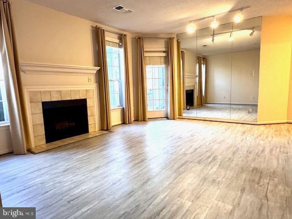 Photo of 20301 Beechwood Terrace #100, ASHBURN, VA 20147 (MLS # VALO2109060)