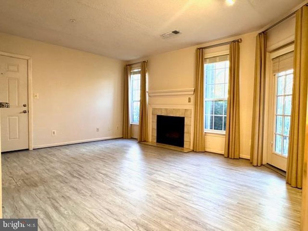 Photo of 20301 Beechwood Terrace #100, ASHBURN, VA 20147 (MLS # VALO2109060)