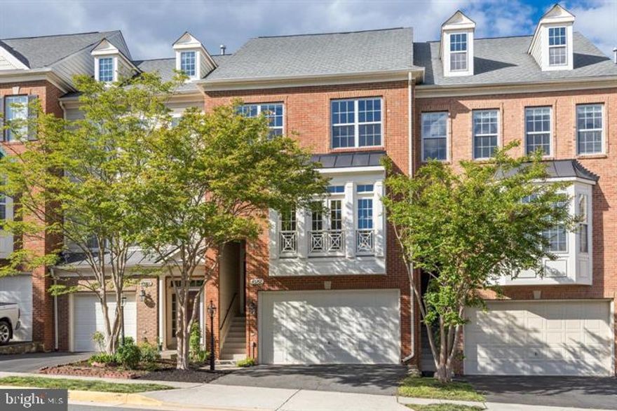 Beautiful, brick front, light filled, 2-car garage townhouse in desired Lansdowne community. Hardwood floors the entire main level, laminate on the basement floor, and newer carpet throughout the top floor. Open floor plan ideal for entertaining, transitioning between living, dining, and family space with hardwood floors and a powder room, to the gourmet, eat-in kitchen and more living space. Kitchen with SS appliances, granite countertops, and additional cabinets and countertops. Large master bathroom with fabulous views and a Jacuzzi tub with jets. Light-filled house with open green view in the back. Walk-out basement with large backyard patio for entertainment and relaxing. Tons of community amenities including indoor and outdoor pools, a fitness center, playgrounds, sport courts and aerobics rooms, a business center, ballroom, and meeting rooms. Basic cable TV and Internet included in the rent. Luxury resort-like living in one of the Northern VA's most desired communities.