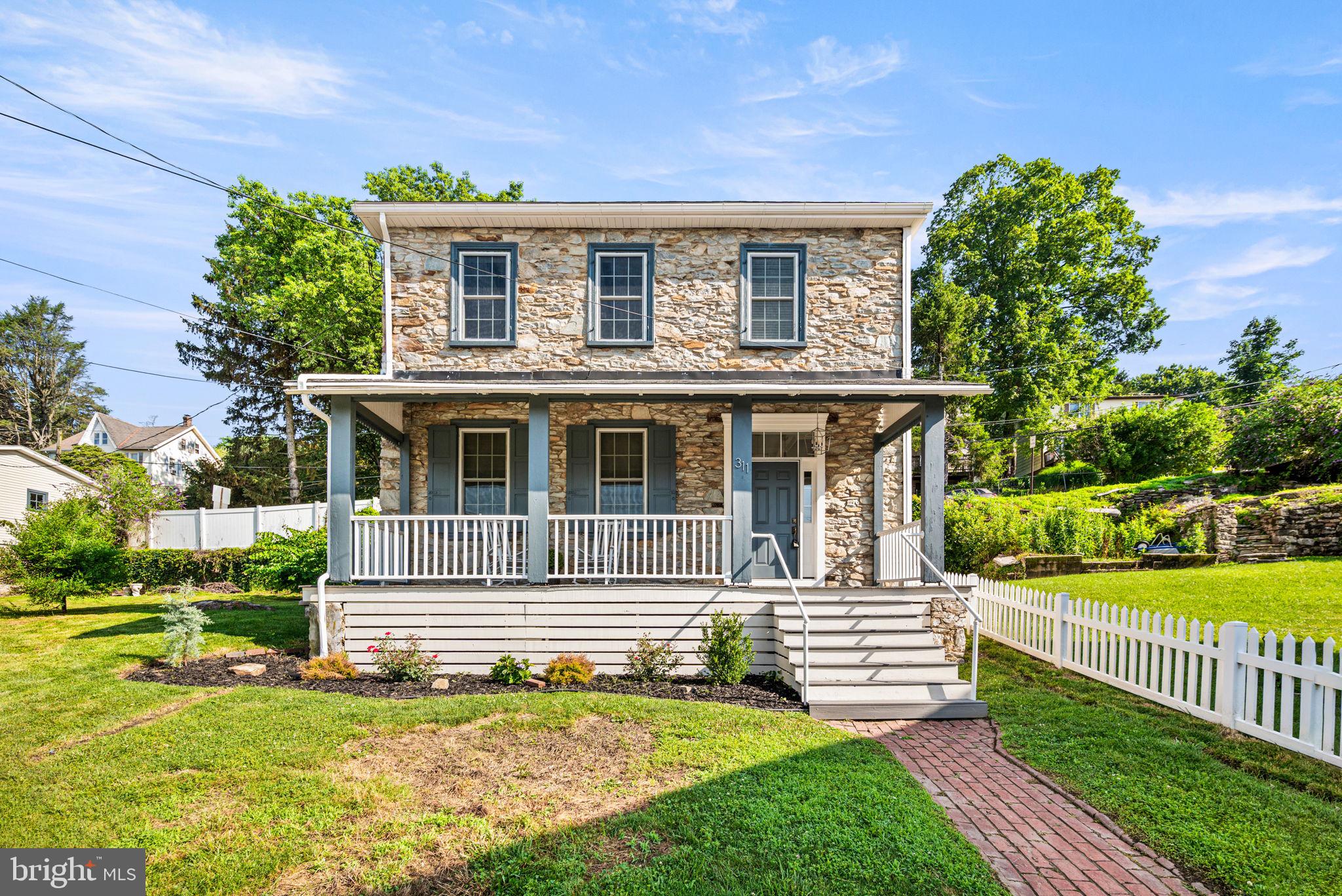 OPEN HOUSE, THIS SUNDAY AUGUST 3rd 2-4pm!
Welcome to 311 Strasburg Ave, Parkesburg! Octorara School District! Historic gem! This stunning stone Colonial, built circa 1900, blends timeless character with modern upgrades throughout. Situated on a level, fenced-in yard, this 3-bedroom, 1.5-bath home offers a detached garage/workshop, and a full basement with laundry and Bilco door access. The land is comprised of 2 lots totaling .2285 acres!
An American Home Shield 1 year Home Warranty is included with the purchase!
Accessory building-The 2 story Detached garage/shop is the ideal accessory building ideal for multiple uses from garage-work shop or storage. This seperate building has electric and access via garage doors through both levels.
Historic Charm throughout!
You'll be instantly drawn in by the breathtaking stone exterior and welcoming covered front porch. Inside, the home showcases beautiful original hardwood floors, a cozy fireplace, and abundant natural light. The gorgeous entry foyer has an exposed stone wall that extends along the staircase up to the second floor. Deep window sills with beautiful woodworking, exposed beams, and trim enhance the historic look and feel of this home. The spacious eat-in kitchen is a chef’s delight, featuring New Appliances, New Quartz counter top, generous counter space, cabinetry, and a gorgeous new herringbone tile backsplash that adds a stylish modern touch. Just off the kitchen are a mudroom and a brand-new first-floor powder room—both practical and well-designed.
Upstairs, you’ll find three generously sized bedrooms and a completely renovated full bathroom with updated fixtures, tile, and finishes. The full basement offers great storage, laundry area, and exterior access via Bilco doors.
Enjoy the private, fenced yard ideal for entertaining, gardening, or pets. The fencing is low maintenance vinyl railing. The front porch is also constructed with low maintenance materials and the windows are replacement tilt in windows.
Located close to the Parkesburg Train Station, the New local shops, restaurants, and commuter routes—311 Strasburg Ave is the perfect combination of old-world charm and modern living. Move right in and enjoy!