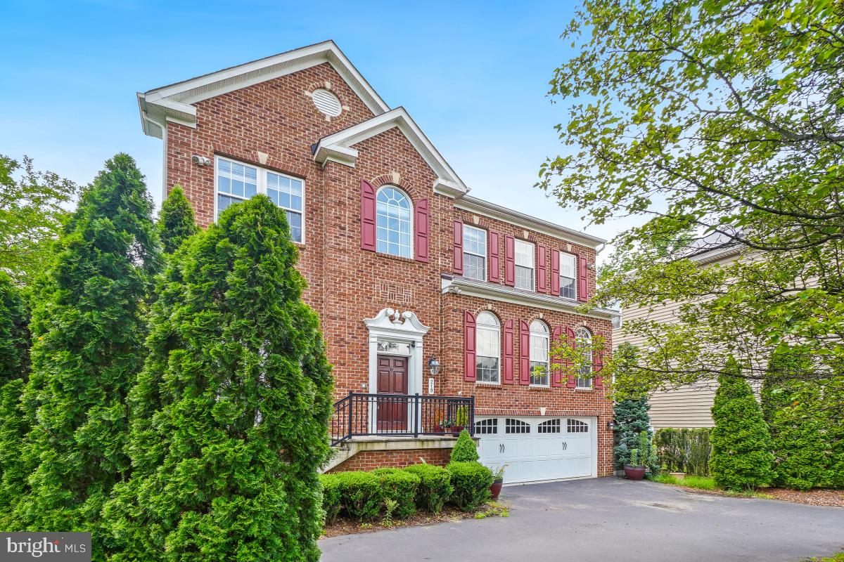 Welcome to your dream home in the coveted Bowen Manor neighborhood! This beautifully customized Jamison model is a rare find, offering exceptional design, luxurious upgrades, and a prime location near downtown Annapolis.Step inside to discover a gourmet chef’s kitchen that’s sure to impress, featuring top-of-the-line stainless steel GE Monogram appliances—including a gas cooktop with center grill, electric oven, double wall ovens (one trivection), and built-in microwave. Just off the kitchen, enjoy the bright and airy sunroom, an elegant dining room, inviting living room, and an optional family room—perfect for entertaining or relaxing with loved ones. With five bedrooms and 4.5 bathrooms, this home offers room for everyone. Beautiful hardwood floors extend through much of the home, complemented by two cozy gas fireplaces and dual laundry rooms—one upstairs and another in the fully finished walkout basement. The luxurious primary suite includes a spacious en suite bathroom and a generous walk-in closet. Two additional upstairs bedrooms also feature en suite bathrooms for added privacy and convenience. Downstairs, the expansive basement offers a large family room with built-in surround sound, a full bath, bedroom, storage room, and a utility space with engineered hardwood and vinyl tile flooring—all thoughtfully upgraded in 2017. Enjoy your private backyard oasis, which backs to serene woods and is fully enclosed with a vinyl privacy fence. A professionally installed irrigation system keeps the lawn lush and green year-round. Additional upgrades include a central vacuum system, whole-home intercom, and custom tile work in three of the bathrooms.