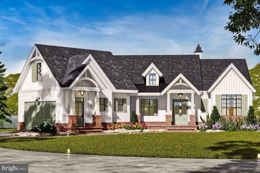 Designed for lake living without compromise, this new construction home with Fall delivery offers over 4,500 square feet and is located in the premier Rock Island Landing community on the private side of Lake Anna, featuring shared waterfront access, a dedicated boat slip, and panoramic open views that stretch wide and uninterrupted.
The exterior blends timeless coastal architecture with refined craftsmanship—layered rooflines, board-and-batten detailing, stone accents, and expansive covered porches—creating a presence that feels elevated yet welcoming.
The brilliance of this design lies in its livability: nearly everything is on the main level, offering true one-level living without sacrificing space or flexibility. The main floor is anchored by a spacious great room with oversized windows positioned to capture the open, sweeping lake views, filling the home with natural light and a constant connection to the outdoors.
The kitchen is designed as the heart of the home, featuring a large center island, generous prep space, walk-in pantry, and seamless flow into the dining area and outdoor living spaces—perfect for entertaining or slow mornings overlooking the water.
The main-level primary suite offers a private retreat with a spa-inspired bath and walk-in closet. Additional main-level bedrooms provide comfort and convenience for family or guests, all thoughtfully arranged for privacy and ease of living.
The upper level features a bonus room with a full bath, ideal for a guest suite, home office, or media space. The partially finished basement expands the living area further with a rec room, bedroom (NTC), and full bath, perfect for entertaining, game nights, or hosting overnight guests while maintaining ample storage.
In total, the home offers 5 bedrooms  ( 1 NTC) and 4.5 baths, thoughtfully distributed to balance everyday comfort with flexibility for hosting.
Rock Island Landing is one of Lake Anna’s most sought-after waterfront communities, known for its quality homes and panoramic views. A rare opportunity to secure new construction with Fall delivery in an established waterfront neighborhood—where thoughtful design, privacy, and wide-open lake views define the experience.
Final specifications, finishes, and selections subject to builder plans. Renderings are conceptual.