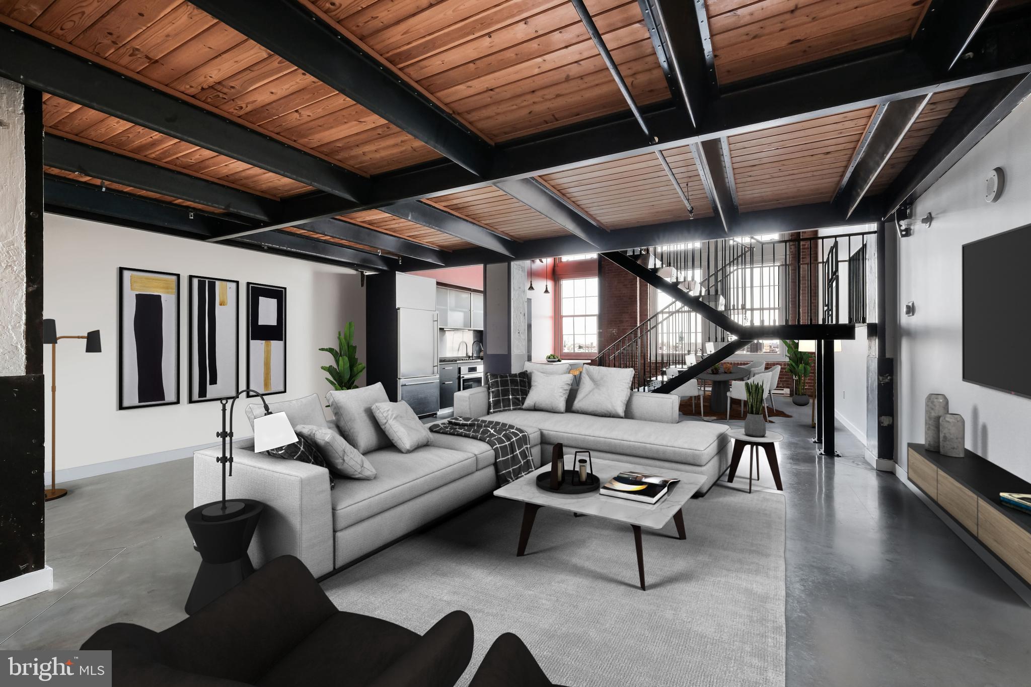 You won’t want to miss this stunning, sun-splashed TWO-BEDROOM, TWO-AND-A-HALF-BATHROOM condominium for rent at 1101 Washington Avenue, located in the BELLA VISTA. Offering over 1,600 square feet of living space, this dynamic and beautifully designed LOFT-STYLE residence comes with the added convenience of DEDICATED PARKING. The home features striking INDUSTRIAL DESIGN elements, including polished CONCRETE FLOORS, EXPOSED BRICK WALLS, and an open, DRAMATIC STAIRCASE that adds architectural flair.
The spacious layout includes large, separate living and dining areas, perfect for entertaining or relaxing at home. A true chef’s kitchen anchors the space, complete with abundant cabinet storage, generous counter space, and modern finishes that make cooking a joy. Each of the two well-proportioned bedrooms includes its own tiled ensuite bathroom, offering privacy and comfort, while a stylish powder room serves guests. Additional amenities include IN-UNIT LAUNDRY and high ceilings that enhance the open, airy ambiance.
Located just minutes from the iconic Italian Market, vibrant Passyunk Square, and both Pennsylvania and Jefferson Hospitals, this residence offers an unbeatable location for both work and leisure. Residents also enjoy the benefits of an ELEVATOR building with a doorman and a fully equipped GYM—adding even more value to this exceptional rental opportunity.
