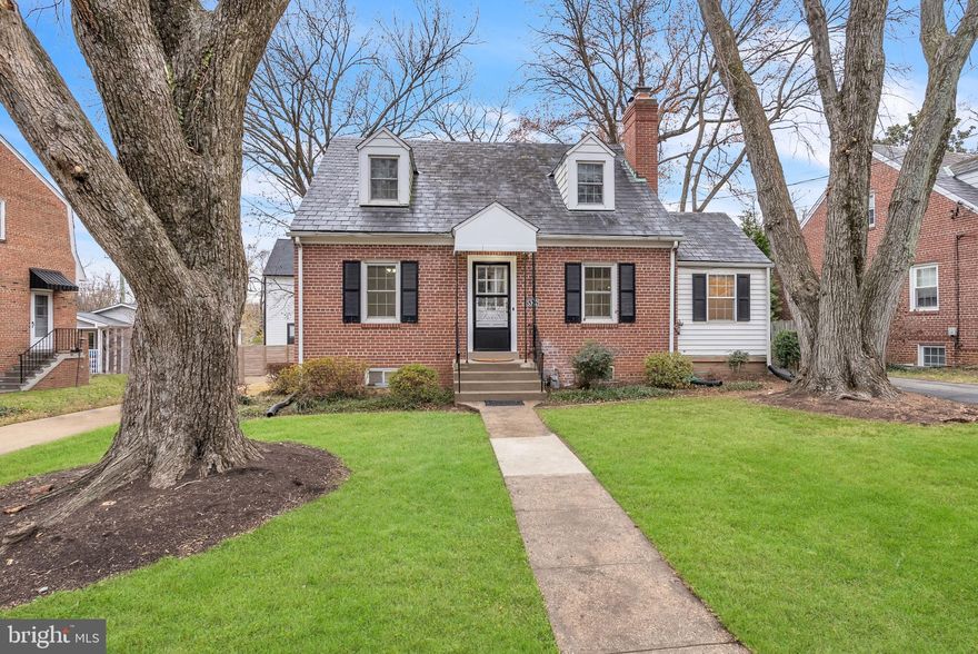 Welcome to this beautifully updated 4-bedroom, 3-bath Cape Cod blending timeless character with modern comfort. Refinished hardwood floors, abundant natural light, and a cozy gas fireplace highlight the main level. The newer kitchen features white cabinetry, quartz counters, and stainless appliances, opening to a versatile bonus room ideal for a family room, office, or mudroom with access to the deck and fenced backyard.

Two bedrooms and an updated full bath complete the main level. Upstairs offers two spacious bedrooms with hardwood floors, another full bath, and extra storage. The walk-out lower level includes a bright rec room with kitchenette, guest/office space, laundry, and storage.

Prime location—just steps to Whole Foods, Metro, Amazon Fresh, and Bloomingdale’s, with easy access to Bethesda, Spring Valley, and favorite local restaurants like Clyde’s, Sushiko, and Joy by Seven Reasons. Pets considered case-by-case. Minimum 700 credit score and 24-month lease required.