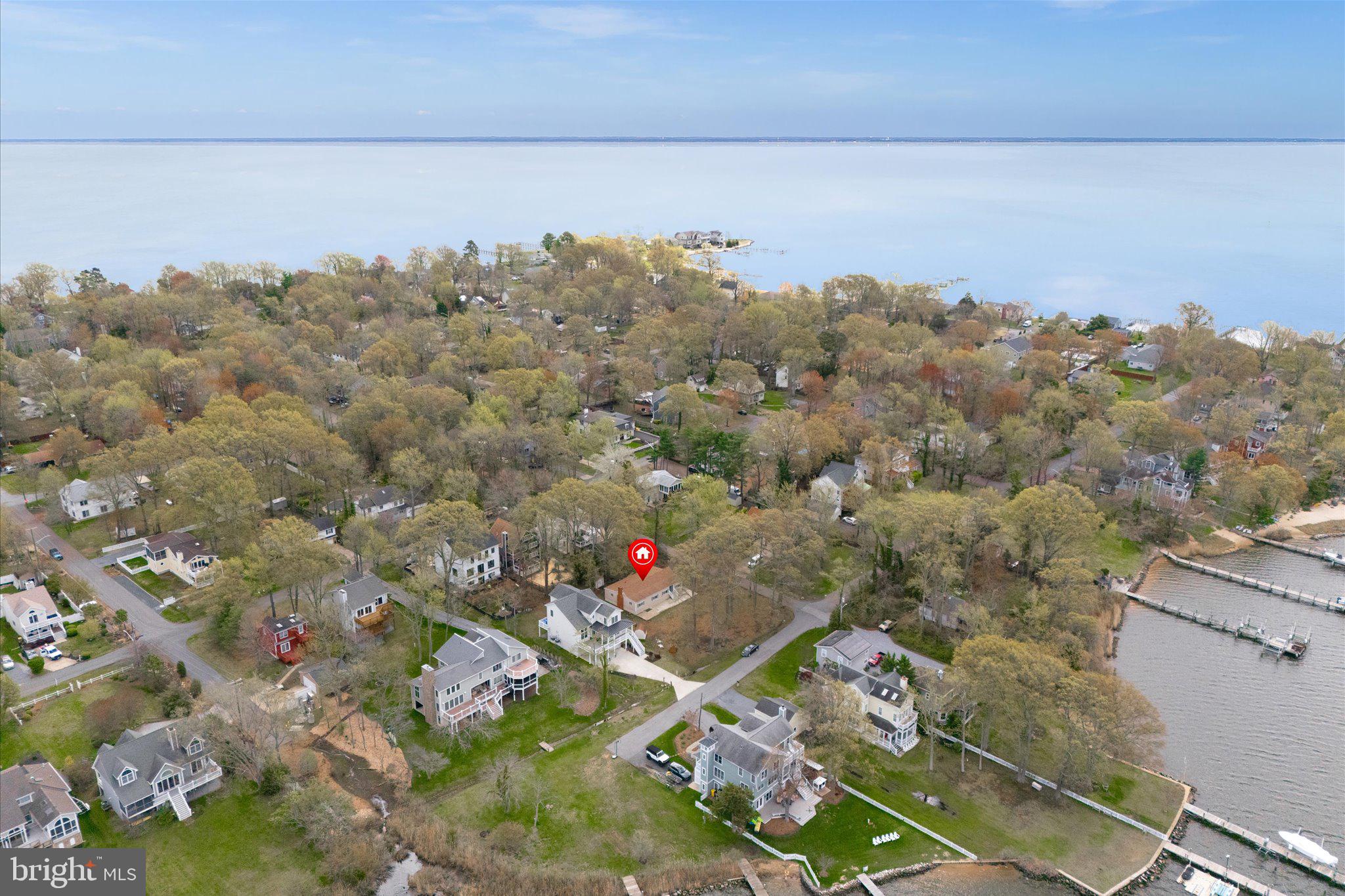 It starts with a feeling.
Maybe it’s the hush of the trees as you turn down the quiet street. Or the way the air softens near the Bay—carrying just a hint of salt, sun, and something slower.
Tucked away on a generous 12,500 sq ft double lot, this fully renovated 3-bedroom, 2-bath retreat in Arundel-on-the-Bay isn’t just a house—it’s where your next chapter begins. The kind where weekends stretch a little longer, mornings feel a little lighter, and coming home feels like a deep breath out.
Inside, the home flows with ease. Natural light spills across fresh finishes. A cozy wood-burning fireplace anchors the heart of the living space. The kitchen is as functional as it is beautiful—ready for impromptu pasta nights, wine with friends, or solo mornings with coffee and silence.
But it’s the enclosed patio where life slows down. Wrapped in windows and light, with a sliding door that opens to a wide backyard and a peek of the Bay beyond, this is where you’ll find yourself most often—book in hand, bare feet on the floor, the day unfolding slowly.
And beyond your own backyard, a neighborhood that feels like a hidden coastal village. In Arundel-on-the-Bay and Oyster Harbor, community isn’t just a word—it’s a lifestyle. From sunrise to sunset, you’ll often find plenty of friendly faces and happy tails soaking up the sunshine and shoreline spirit in this , launching kayaks into the Bay, or heading down to the private beach to watch the sunset melt into the water. It's a place where salty breezes, friendly faces, and happy tails are part of the everyday scenery. With access to Oyster Creek, Fishing Creek, and the Chesapeake Bay, there’s always something to discover.
Take advantage of multiple marinas, community boat ramps, Newport Pier (with slips on a first-come basis), playgrounds, basketball courts, kayak/SUP storage, picnic areas, and walking trails that wind through nature and shoreline. And for dog lovers, Quiet Waters Park—with its popular dog beach and scenic trails—is just a short drive away.
And when it’s time to reconnect with city energy, you’re only minutes from historic downtown Annapolis, and with easy access to Route 50, I-97, BWI, and the Eastern Shore, you’re never far from wherever life takes you.
But chances are… you won’t want to leave.
Because some homes aren’t just about square footage or finishes. Some homes are about how they make you feel.
And this one? This one feels like peace.
Welcome home.