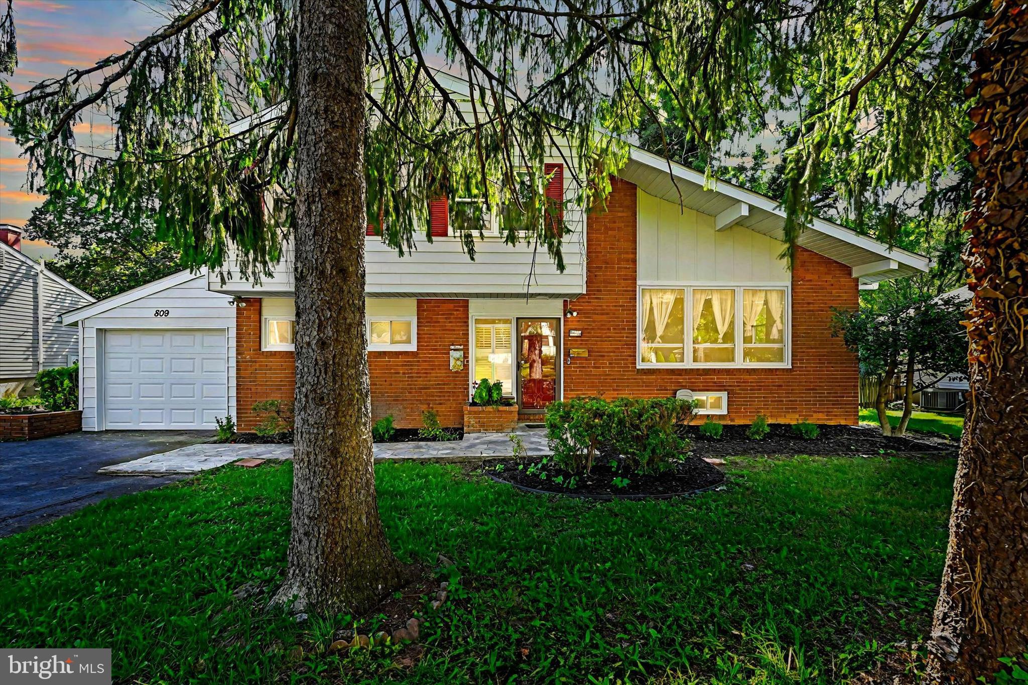 This charming four-bedroom, two-bath home beckons with ample space, perfectly nestled between the vibrant energy of Towson and the tranquility of lush nature—delightful for both comfort and convenience. This 2,384-square-foot home offers brand new interior and exterior paint, carpets, and flooring. Step outside, and you'll be greeted by an expansive outdoor space with a brand-new Italian tile deck, a serene fish pond, a gazebo, and beautiful landscaping—a true oasis of relaxation. The kitchen features new quartz countertops, brand stainless-steel appliances, a bar area, and an eat-in area with a beautiful backyard view. The newly refinished basement provides an extra layer of living space, suitable for an entertainment center, an office, or a cozy den. A few minutes away, tranquil Loch Raven Reservoir, Cromwell Valley Park, and Tiger Plaza offer a green escape, perfectly balancing urban convenience and natural respite. Nestled in a friendly neighborhood, quick and easy access to 695, 83, and 95. Convenient to many shopping, dining, and entertainment options. Walking distance to a magnet elementary school. This home promises a harmonious blend of lifestyle and comfort, waiting for you to make it yours.