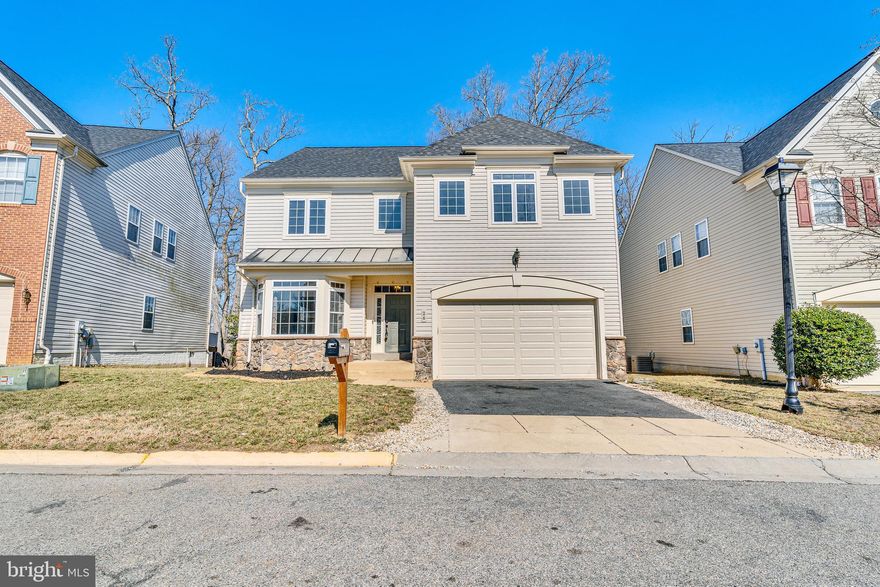 OFFER DEADLINE: Monday, March 10 at 12 noon! RIVERWATCH - a community situated along the Potomac River! This home offers a premium lot location with views of the water and neighborhood boardwalk/path that lines the water's edge. A commuter's dream, you won't be far from area miltary installations, National Harbor, or 495 into DC/VA but you'll reap the benefits of living in a more cost effective area outside of the major city and being near the water. This home has been recently improved with fresh paint, power-washing & professional cleaning. Front load 2 car garage leads into the home where you'll find a formal open living area, open kitchen, dining room, second living area with fireplace, more living space, breakfast nook with rear door leading to back yard. When you see the view from the upper-level primary bedroom you might as well end your search, because you may not want to leave. The large room and sitting area sit perched above and overlooking the back yard, woods and view of the waterfrontage and community boardwalk. This view is truly something special that about 3 homes in this neighborhood have! WIC and full luxe bathroom complete the primary suite. 3 secondary bedrooms are of very good size and there is a laundry room as well rounding out the upper level. The basement is unfinished, walk-out. Room to be creative to finish the space or for plenty of storage!