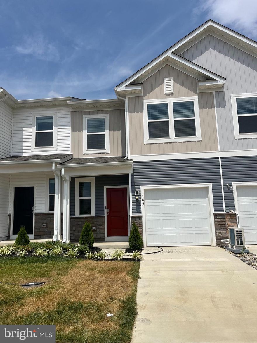 This nearly new, one-year-old townhouse features a one-car, front-load garage with driveway parking and is ideally situated facing a large common area planned to include a soccer field, tot lot, gas grills, and a dog park. The home offers numerous upgrades, including stainless steel appliances, upgraded cabinetry, granite countertops, full-house window blinds, washer and dryer, and a garage door opener.

The layout includes three bedrooms, two and a half baths, and multiple smart-home features such as a programmable thermostat, video doorbell, and keyless entry. The HOA covers .

Landlord pays the HOA fees. Trash service and lawn maintenance is included in the HOA.