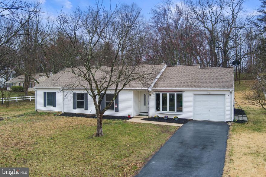 OPEN HOUSE CANCELLED<p>Nestled in the established community of Rolling Hills, this 2164 SF ranch on nearly half an acre welcomes you. Gone is your cramped apartment, replaced by eight rooms in which to roam and a partially fenced, tree-filled yard.</p><p>The main entrance invites you into the living room, featuring neutral paint and carpet, and a bow window overlooking the neighborhood. From there, step into the great room, a combination of renovated kitchen, sunroom, and dining area with white cabinets, stainless steel appliances, tile floors, a wall of windows, and a recently installed coffee bar.</p><p>From the great room, you can access the adjacent pantry, the one-car garage, the rear patio, and a bonus room that you can choose to be your home office, exercise area, playroom, or guest space. The carpeted bedrooms are separated from the living area, and you will find a real laundry room with new side-by-side machines along your way there. </p><p>The spacious primary bedroom has two large closets, an ensuite bath with a jetted tub, a stall shower, an extra long vanity, and access to the rear yard. Three additional bedrooms are served by a tiled hall bath, with another jetted tub, stall shower and large vanity.  What more could one ask for?</p>