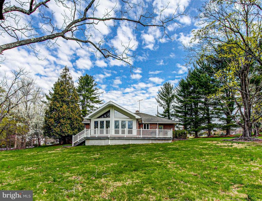 Filled with promise and years of memories and love, this home is going to be a delight to its new lucky owners.  This 3 Bedroom, 2.5 Bath home with brick exterior & gorgeous sun room is on 1.68 acres.  What a great location!  Just 2 minutes to Fischer's Park,  5 minutes to the NE Extension of the Turnpike and 13  minutes to Montgomery County Community College.  The quiet neighborhood with a variety of  homes nicely spaced apart and the spacious front porch make this feel like somewhere to put down roots.   Inside, the hardwood floors and updated kitchen, the gorgeous sunroom with vaulted ceilings, the central air, and newer HVAC add to the home's appeal.  You will be pleased with the huge, unfinished basement that is ready for your ideas,  along with the room on the side of the home that could make a great office, huge pantry, craft room or remodeled additional bathroom.  The 2 car garage, the nice flat private yard, the wide driveway that allows for plenty of parking, the maintenance-free trex deck and vinyl railings make this an easy decision.  There is an Open House on Saturday 4/19/25 from 1-3pm.  Please contact me with any questions!  Thank you!
This home is being sold as-is which is reflected in the price, though is move-in ready.