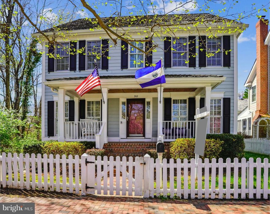 This gorgeous home offers beautiful updates and a spectacular location! The picturesque front porch welcomes you into a main level with a fantastic, flowing floorplan and large, light-filled rooms. The entry foyer is flanked by a formal living room and formal dining room, both with hardwood floors.  The newly renovated kitchen is a chef's dream, featuring quartz countertops, stainless steel appliances, updated flooring, and decorator lighting and fixtures. The kitchen includes a sunny breakfast area. The generous family room features a masonry fireplace and hardwood floors and access to one of this home’s most special features, the screened porch, a perfect spot to relax and entertain overlooking the lovely back lawn and gardens. This level also includes a spacious, private office offering lovely views of a tranquil stream adjoining the side yard. Upstairs, hardwood floors extend into the luxurious primary suite, which features a double-door entry, tray ceiling, two big walk-in closets, and a beautifully updated  primary bath with a double sink vanity, a glass-enclosed shower, and a soaking tub. The three additional generously sized bedrooms on the level are bright and sunny. This also includes the second full bath with a double sink vanity and a conveniently located laundry room. The fully finished, daylight lower level offers incredible versatility, with a large recreation room, wet bar, and another of this home’s most special features, an intimate wine tasting room with custom wine storage made from vintage reclaimed wood. A fifth bedroom and third full bath provide additional living space. Outside, the expansive backyard offers plenty of space to relax, play, and entertain. In a prime location, this home provides quick access to Rachel Carson Elementary School, nearby parks and playgrounds, the exceptional Kentlands recreation facilities, and the vibrant Kentlands Downtown.
