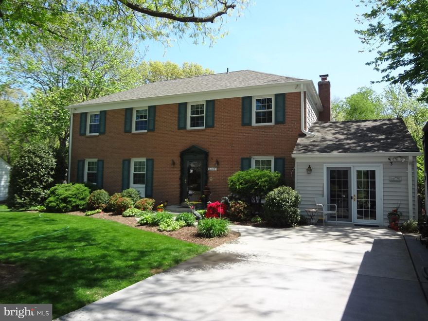 Lovely updated and meticulously cared for Brick Front Colonial! Home offers 4 Bedrooms & 2.5 bathrooms, renovated gourmet kitchen, new windows, new roof, patio, hardwoods throughout plus a studio.  Beautiful landscaping and private patio backing to woods. Separate Hot Tub area. 1 mile +- to Kingstowne Towne Ctr & Van Dorn Metro!