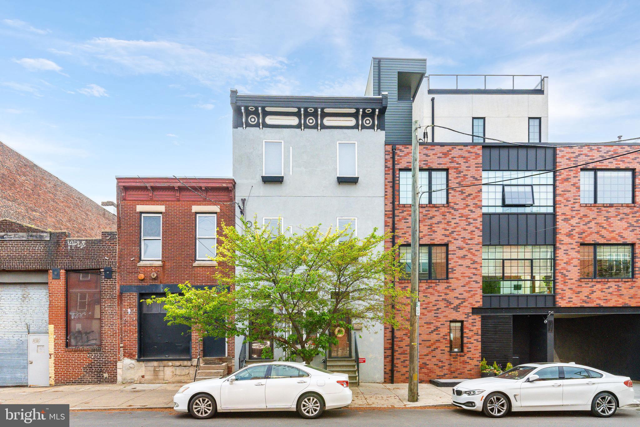 Nestled in the heart of FISHTOWN, blocks from Johnny Brendas, Frankford Hall, La Colombe, Pizza Shackamaxon, and much more, this modern 2-bedroom, 2 bathroom condo with private rear deck is an urban dweller’s dream! Entering into the common hallway and taking the stairs to the 2nd floor you'll be greeted by an open concept living space and kitchen/dining area with beautiful hardwood floors flowing throughout the unit. High ceilings with exposed ductwork give this unit a industrial vibe as your afternoon sun pours in. Espresso shaker cabinets, granite countertops and stainless steel appliances with gas cooking greet you in the kitchen with space for dining and entertaining. The primary suite is at the front of the unit with a spacious bedroom, two large closets, and ensuite bathroom with subway tiled shower. Off the kitchen is a utility closet with laundry and extra storage. A guest bathroom with shower/tub combo is in the rear hallway with another spacious bedroom for guests or home office! Last but not least take the rear door to your private roof deck where you can imagine spending summer days hosting friends for a delightful get together! Located in one of Philadelphia’s most sought-after neighborhoods with a Walk Score of 96, this home is just a 3-minute walk to Girard Station and culinary hotspots like Suraya, Pizzeria Beddia, the James Beard-nominated Kalaya Thai Kitchen, The Fillmore, Other Half Brewing, and Punch Line Philly—all within steps of your door. Reach out today for private showing!