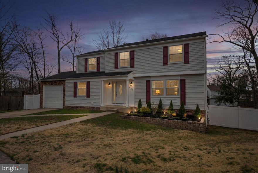 Thoughtfully updated and beautifully maintained, this spacious Colonial offers timeless comfort, generous living space, and extensive recent upgrades in a desirable cul-de-sac setting. Major updates completed in 2020 include hardwood flooring, an updated kitchen with white cabinetry, upgraded countertops, stainless steel appliances, and updated laundry room appliances, along with renovated showers, energy-efficient dual-pane windows and doors, plus a new furnace, hot water heater, and A/C for added comfort and efficiency. The upper level offers four generously sized bedrooms, including a spacious primary suite with a walk-in closet and en-suite full bath. Additional improvements completed in 2021 include a brand new garage, recessed lighting, sump pump, remodeled bathroom, replacement basement windows, updated insulation, and luxury vinyl flooring in the living room. The basement has been professionally waterproofed and offers clean, open space ready for recreation, workout, hobby, or additional living space. A versatile bonus room on the main level provides ideal flex space for a home office or playroom. Outside, enjoy a fenced backyard with mature trees, a spacious flat lawn, and plenty of room for entertaining or everyday enjoyment.