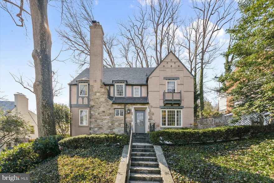 Located on coveted Dexter Street and gracefully set back from the road, this elegant Tudor-style residence offers over 4,000 square feet of beautifully finished living space across four levels. Blending timeless architectural charm with meaningful modern upgrades, the home delivers exceptional comfort and livability.

The main level features a gracious living room with fireplace and custom built-ins, a welcoming family room overlooking the rear patio and landscaped garden, and a brand-new eat-in kitchen. Thoughtfully redesigned, the kitchen showcases new appliances, hardware, cabinetry, and new lighting—creating a bright, modern space ideal for everyday living and entertaining.

Upstairs, the spacious primary suite includes a walk-in closet and a renovated marble bath with double vanities and heated floors. In total, the home offers 4–5 bedrooms and 4.5 baths, including a private fourth-floor guest suite, providing excellent flexibility. A large lower-level recreation room and attached garage complete the interior. A rare opportunity to own a beautifully updated Tudor on one of the neighborhood’s most desirable streets!