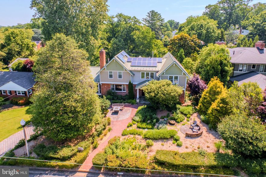 <p>A Private Sanctuary Like No Other in Falls Church City’s sought-after Broadmont. Inspired by Nature, Designed for Living.</p>

<p>If the idea of living fully integrated with nature in an eco-conscious home, surrounded by an organic, carefully planned landscape appeals you, this could be your 1 of 1!</p> 
<p>2007 full remodel surrounded by masterfully designed gardens on almost half an acre. Natural light and garden vistas abound in the well-planned interior, centered on bringing nature indoors.</p>

<p>Upper-level Primary Suite wing with Private Balcony (overlooking rear gardens, framed in tapestry of mature trees) two walk-in closets and gas fireplace.  Sky-lit en-suite with dual vanities, steam shower and private WC, all in calming natural tones.</p>

<p>Main-Level dual office/ in-law or guest suite. Screened-in Porch off Kitchen connects to full width rear deck with access to Dining Room and back office/bedroom, all with their own views of the gardens.</p>
 
<p>Lower-Level cozy Rec Room with 3rd Fireplace and view of gardens, French doors for easy indoor/ outdoor entertaining, also doubles as additional guest suite with built-in Murphy bed and full bath w soaking tub.</p>

<p>Plentiful well-organized storage options throughout, including closets, easily accessed attic spaces, dedicated lower-level storage room and full-length former rear-load garage.</p>

<p>Designed and cared for to exacting standards and eco-conscious methods in all respects.</p>

<p>For more detailed information, see document section.</p>