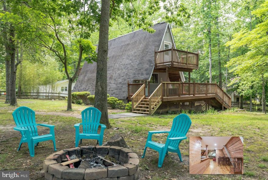 This A-Frame makes the perfect starter home! It sits beautifully on a spacious, corner lot. The eat-in kitchen flows perfectly into the living space on the main level. You’ll love the gorgeous hardwood floors and shiplap walls throughout. The primary bedroom and en-suite bathroom with LVP flooring complete the 1st floor.  A spiral staircase leads you to the two large bedrooms on the upper level. The outdoor living space features a two-tiered deck that overlooks the level backyard with plenty of room for all your favorite people and pets. The location is convenient to shopping, restaurants, Solomons Island, and Patuxent River Naval Air Station.