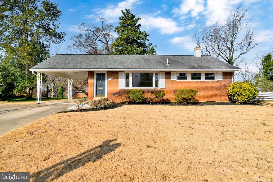 Welcome home to convenient living in the Virginia Hills neighborhood of Alexandria! With a beautifully renovated kitchen, freshly refinished wood floors, new paint throughout, modern LVP floors in the oversized basement, a large yard featuring mature zoysia lawn, and three sunny bedrooms, you’ll have room to entertain, work, and relax in this move-in ready home. And it’s all within a quick drive to Route 1 shopping, Old Town dining, and DC adventures! The light and bright main level of this home boasts a large living/dining room and three bedrooms—each with ample closet space. In the brand-new kitchen, sleek white shaker style cabinets with contrasting black hardware soar to the ceiling while marbled white quartz counters, with a waterfall edge at the kitchen entry, offer plenty of cooking prep space. Stainless Steel appliances and new flooring complete the contemporary look. From there, you have easy access to the carport and basement. The finished basement has two large rec rooms, a bathroom, a separate den/office with walk out access (making it an optional fourth bedroom), and a laundry/utility room. The possibilities are endless with this abundant space – man cave, game room, home theater, additional living room, office(s), exercise space or perhaps a hobby room, to name a few. This home sits on a large flat lot with a patio in the backyard on one of the prettiest streets in the neighborhood. You are within close proximity to the community pool and Franconia Rec Center, and you have quick access to Telegraph Road, bus stops and Metro.  An open house is scheduled for 3/3 from 1 to 3 pm.