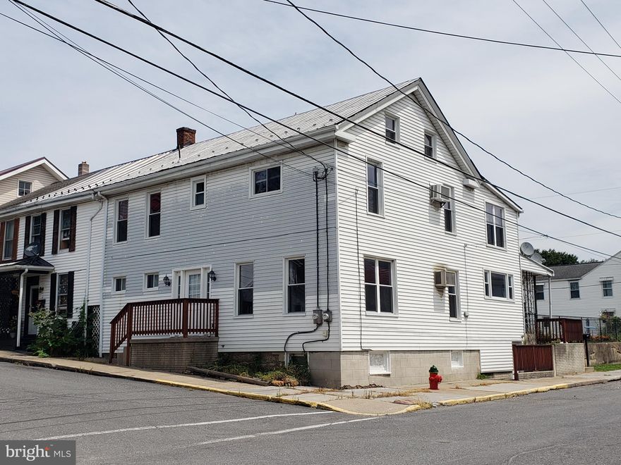 Large home on the corner of Fourth and Orange St in Mifflintown with 2  sizable 2 bedroom apartments, fenced yard, and off-street parking. The first floor apartment has an updated kitchen with a breakfast nook, dining room, large living room, full bath, laundry room, and two huge bedrooms with plenty of closet space. The second floor apartment consists of  kitchen with eat in area, dining room, large living room, under stairs laundry, full bath, two sizable bedrooms, and a walk up third floor with a storage room and an additional room that could be used as a third bedroom or office. Level fenced yard with a storage shed and unfinished basement. Corner lot with 2 off-street parking spaces.