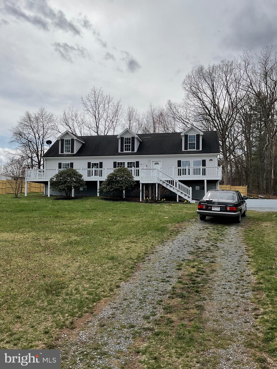 This place is gigantic! Vacant. Go and Show! Approximately 5000 square feet of living space. 1200 square feet of decking ( front and rear with ramp ) 5 minutes to the little town of Paw Paw. 45 minutes to Winchester.
Completely renovated inside with higher end kitchen and baths. 6 bedrooms 4 FULL baths. New HVAC Master suite with walk in closet and tub on main level. 3 bedrooms upstairs, basement finished and could be easily further improved into a separate dwelling. Come take a look before it’s gone. There is NOTHING this large at this price point. Seller offering 5k towards closing costs.
