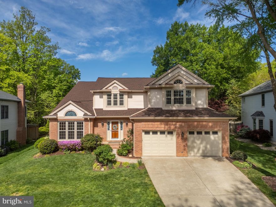 Welcome to this extensively renovated and beautifully appointed residence, tucked away on a quiet cul-de-sac in the highly sought-after Crosspointe community. Offering 5 bedrooms and 5 full bathrooms, this exceptional home seamlessly blends timeless architecture with comprehensive 2026 upgrades throughout.

Step inside to a breathtaking two-story foyer and family room, where soaring ceilings and a graceful curved staircase create an unforgettable first impression. The thoughtfully designed layout features a highly desirable main-level primary suite, complete with a luxurious spa-inspired bath showcasing a freestanding soaking tub, separate glass-enclosed shower, and dual vanities.

A spacious main-level bedroom with a full bathroom just outside offers ideal flexibility for guests, multi-generational living, or a private home office.

Upstairs, one bedroom features its own private ensuite bath, while two additional bedrooms are connected by a well-appointed Jack-and-Jill bathroom, providing both comfort and functionality.

The fully finished walk-up basement expands the home’s versatility with a large recreation area, full bathroom, and an additional finished room with an ensuite bath, ideal for guests, extended stays, or a private retreat. A spacious unfinished area provides excellent storage options.

Nearly every detail of this home has been thoughtfully renovated in 2026, including a fully redesigned kitchen with brand new appliances, all bathrooms, lighting, fixtures, hardware, fresh designer paint, exterior lighting, and a new garage door, offering a truly move-in ready experience. Major systems have also been updated, providing peace of mind for years to come.

Located in a quiet, community-oriented neighborhood, residents enjoy access to Crosspointe Swim and Racquet amenities, including pools with lifeguards, swim team, tennis, pickleball, basketball courts, scenic ponds, trails, and playgrounds. Ideally situated just minutes from Lake Mercer, Burke Lake Park, Fountainhead Regional Park, and Laurel Hill Golf Club, with shopping, dining, and fitness options nearby.